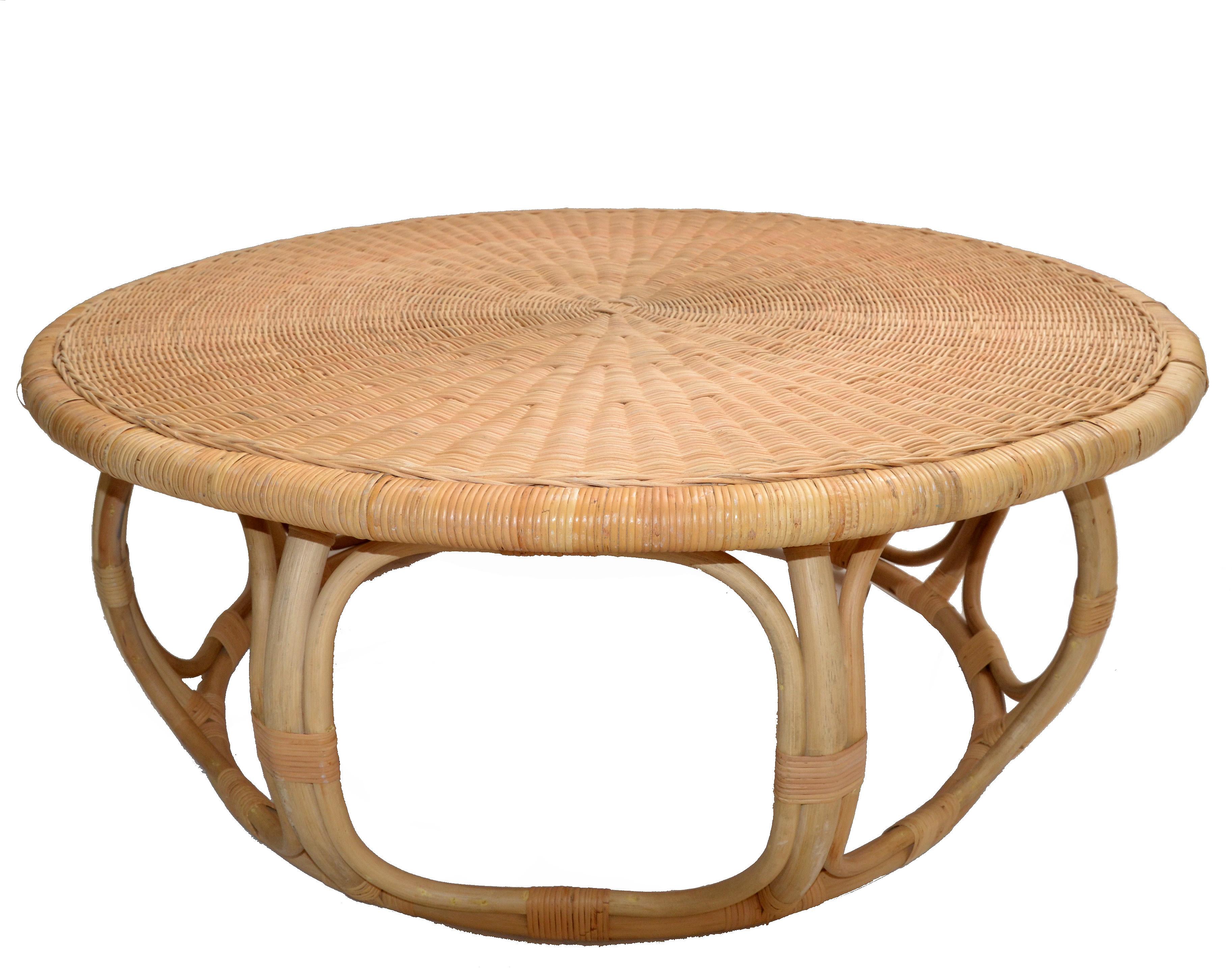 Contemporary Organic Modern round handwoven rattan, wicker coffee or cocktail table in un-refinished condition.
Exemplary construction, woven ties are firmly linked.
Florida Design for Your Sunroom or Porch.