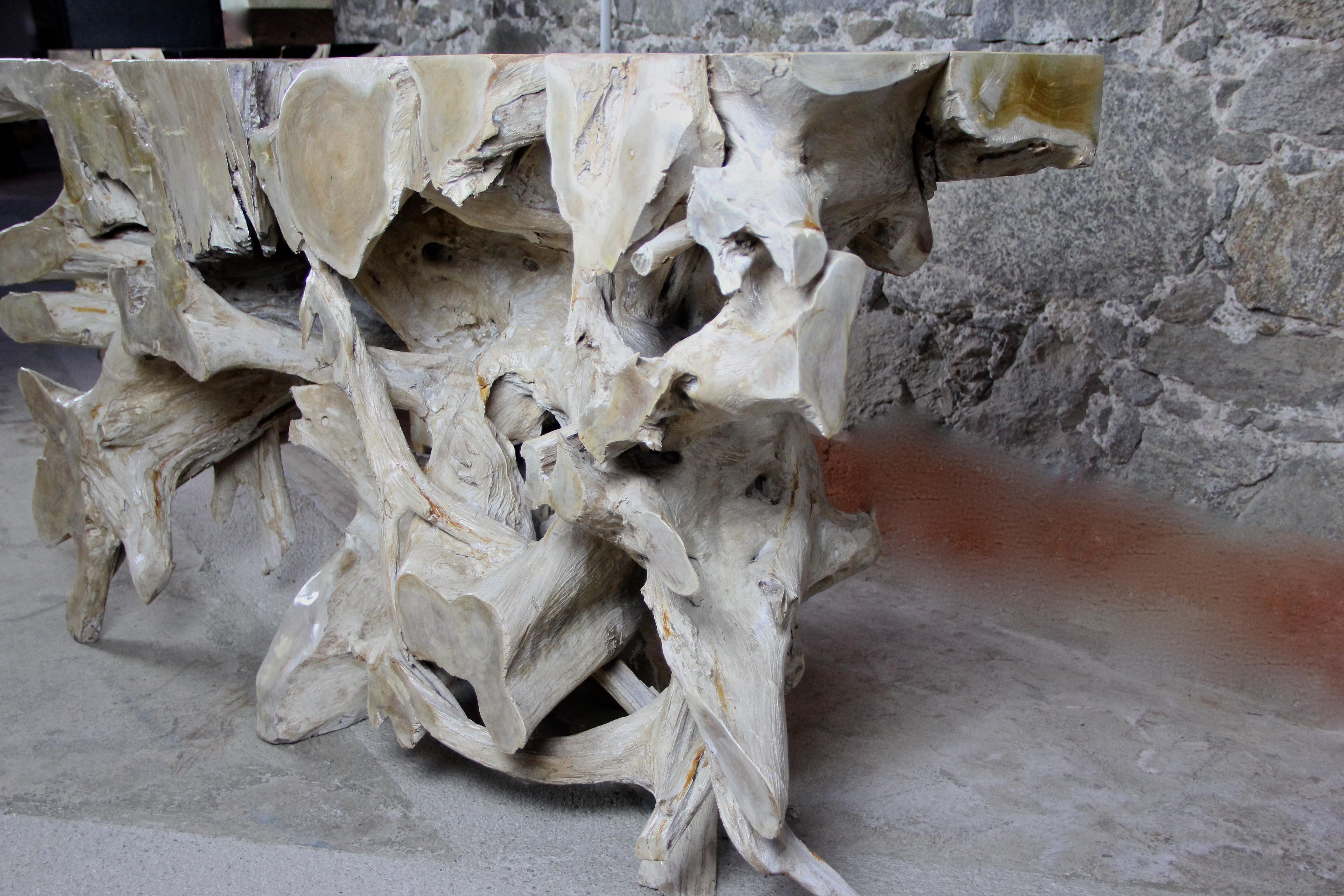 Uncommon organic modern teak root wall console glossy lacquered in a very special design. This unique shaped console table has been artfully made out of a massive teak root and was lacquered by the artist in a matchless way conferring it the look of