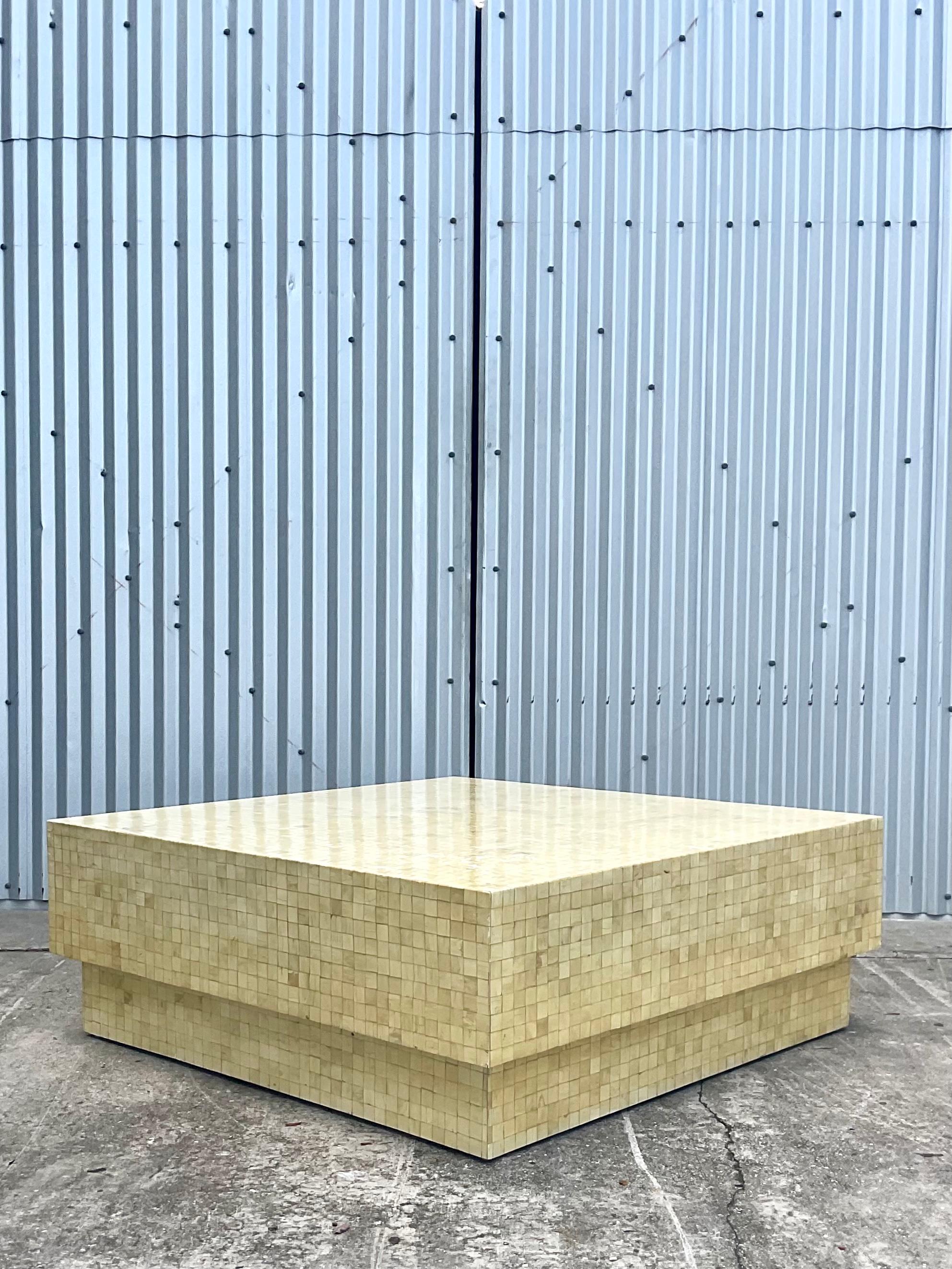 Incredible vintage Organic Modern coffee table. Beautiful tessellated bone in a double decker design. A real showstopper. Acquired from a Palm Beach estate.