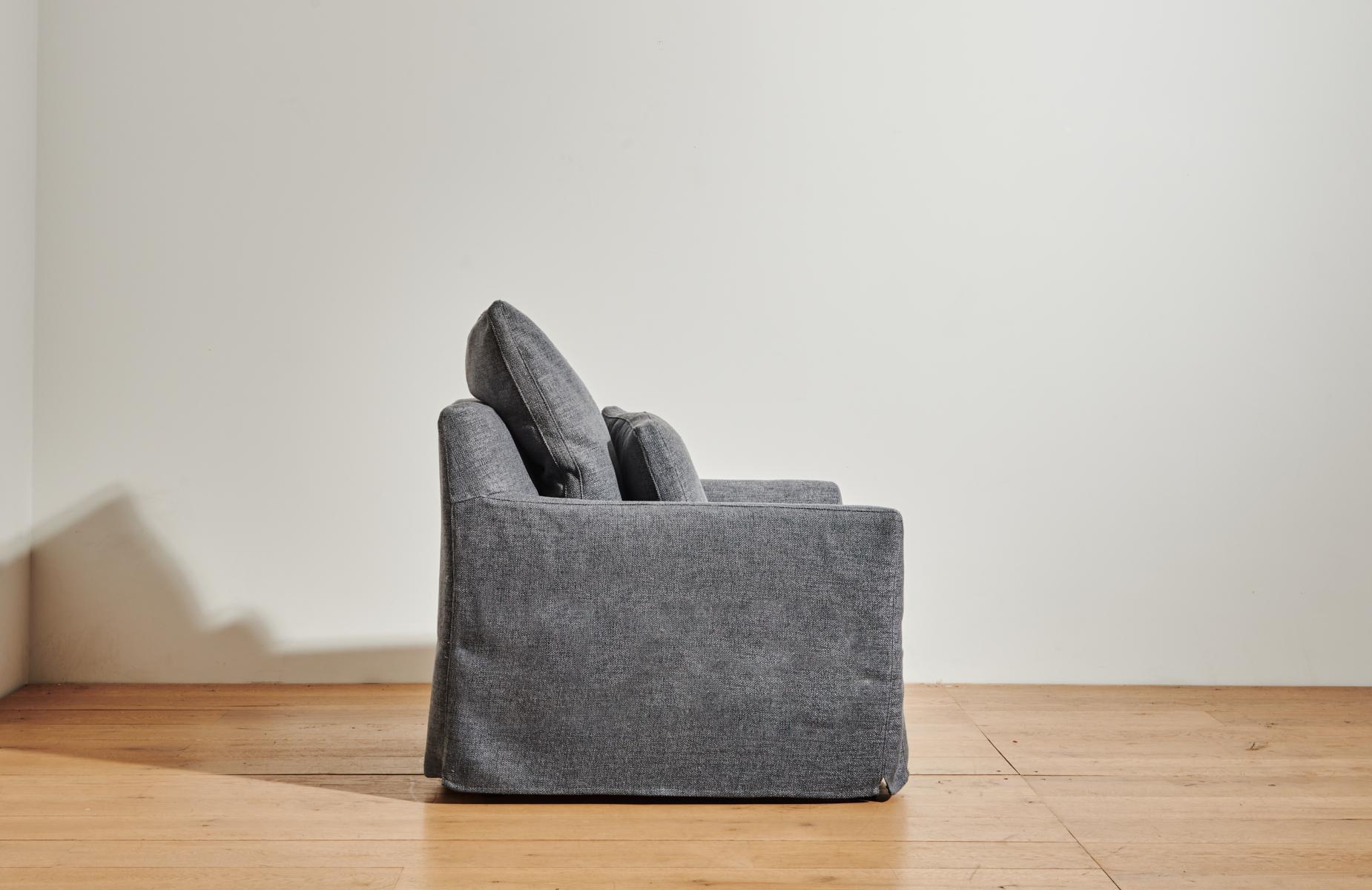 The Cisco Brothers slipcovered Dream Chair in new dark grey fabric, Bellamy Slate, combines comfort, quality craftsmanship, and durable, eco-friendly manufacturing to result in a stylish organic modern lounge chair for your living room. 

Cisco is