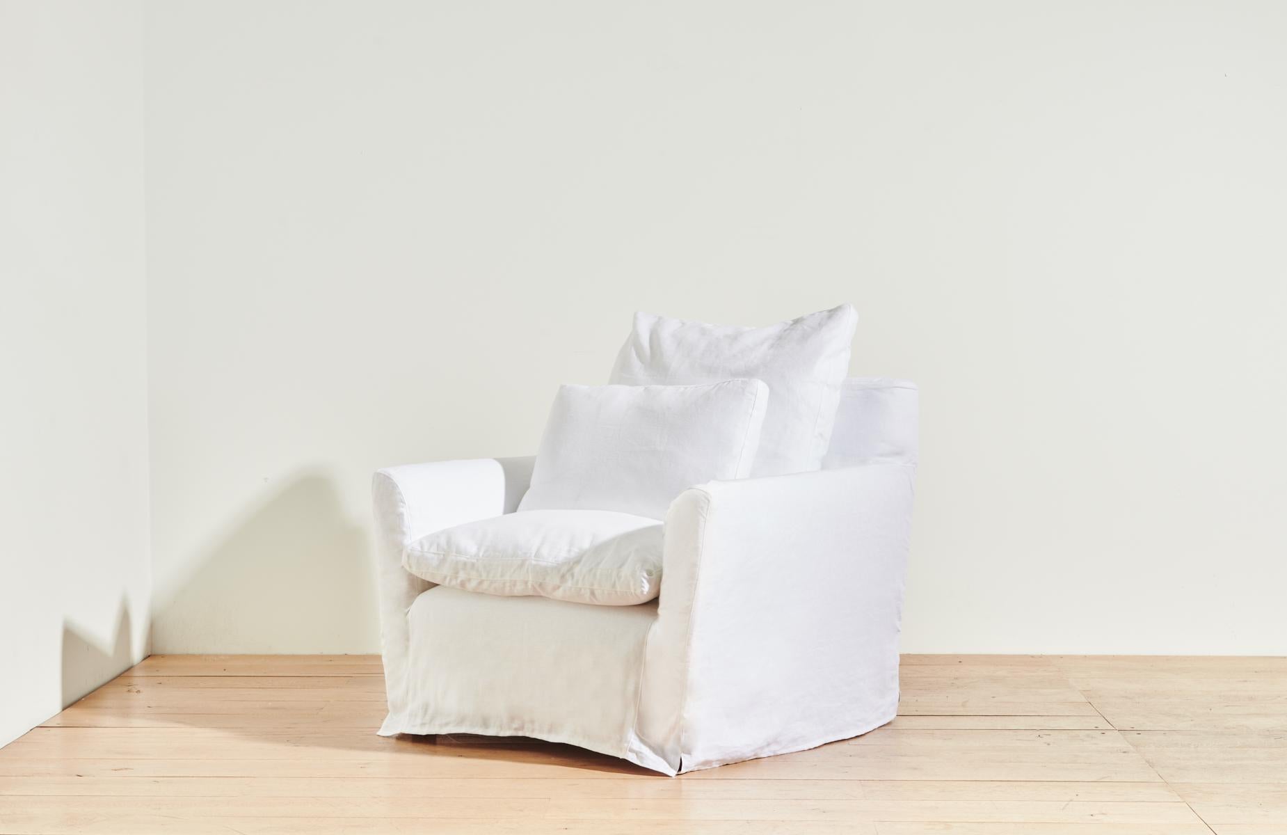 The Cisco Brothers slipcovered Donato Chair in Otis White linen combines comfort, quality craftsmanship, and durable, eco-friendly manufacturing to result in a stylish organic modern lounge chair for your living room. 

Cisco is considered one of