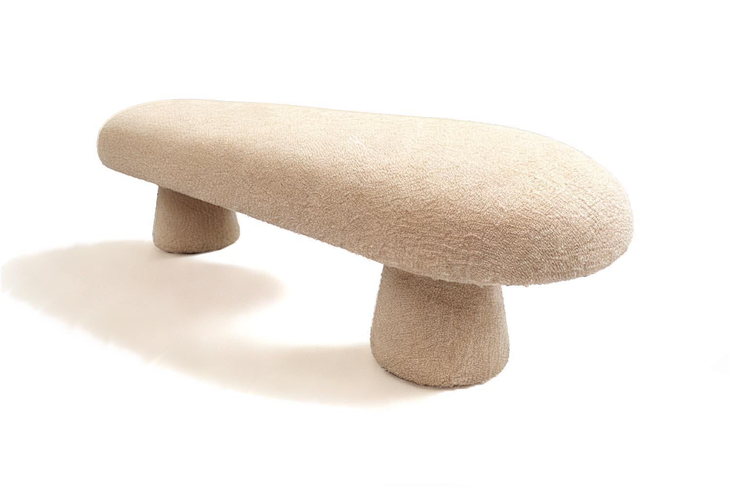 The Éxtasis Bench captures the charged stillness of a moment on the edge—the spark before a revelation, the breath before the leap. With its rounded, organic form and sculptural legs, it radiates contained energy, like something about to