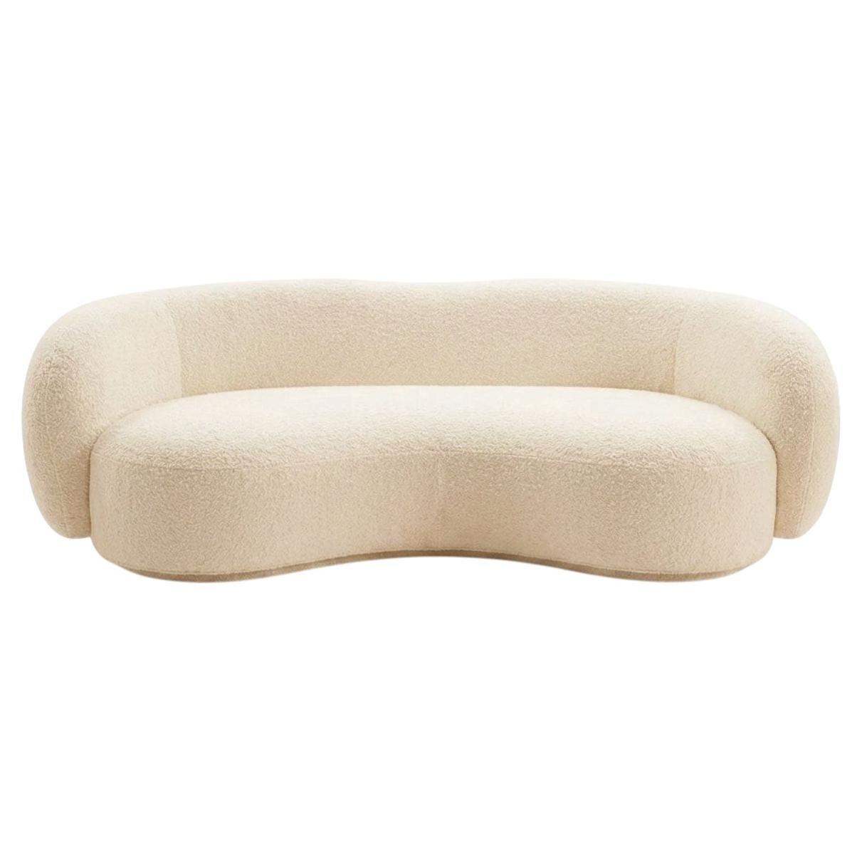 Divano Melancolía in bouclé bianco moderno e naturale