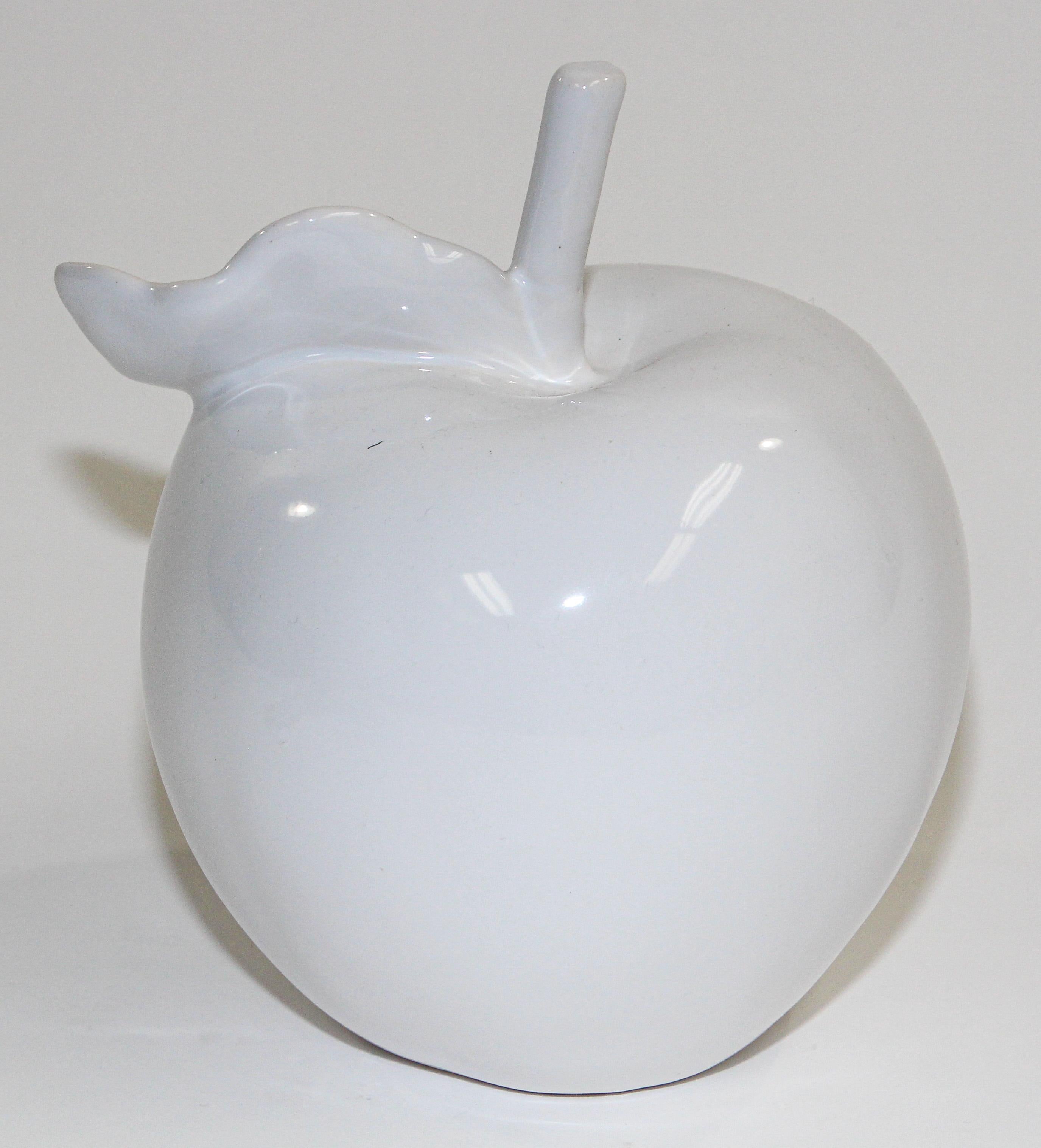 Organic Modern classic minimalist white porcelain apple sculpture.
The beauty of natural shape is on full display with this apple form that have graced still-life art for centuries. The apple is made of porcelain Blanc de Chine.
This contemporary