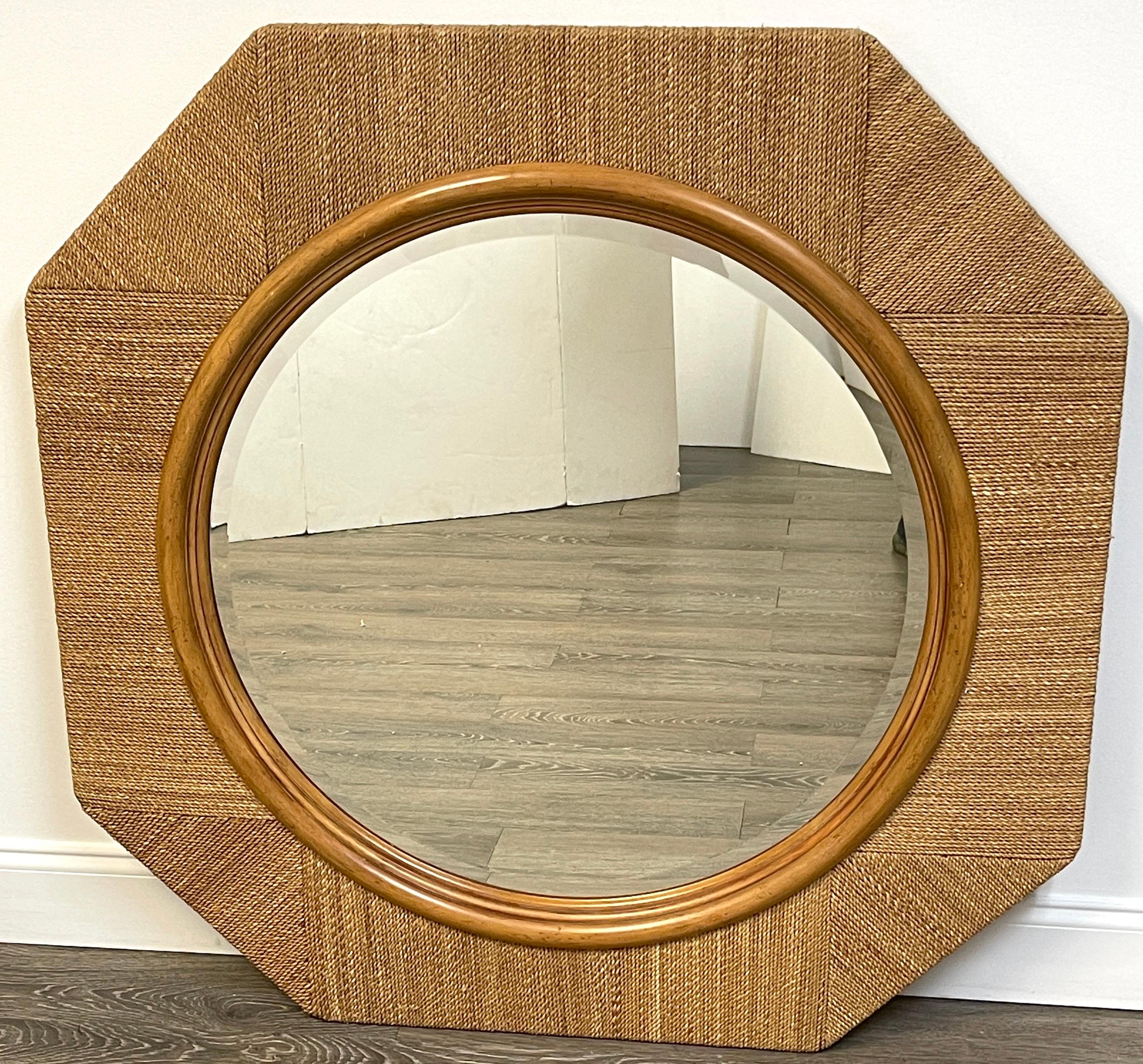 Organic modern woven rope octagonal porthole mirror. 
Well crafted, of good size 42-inches high x 43-inches wide, with an inset 29-inch diameter beveled mirror. Ready to place.
 