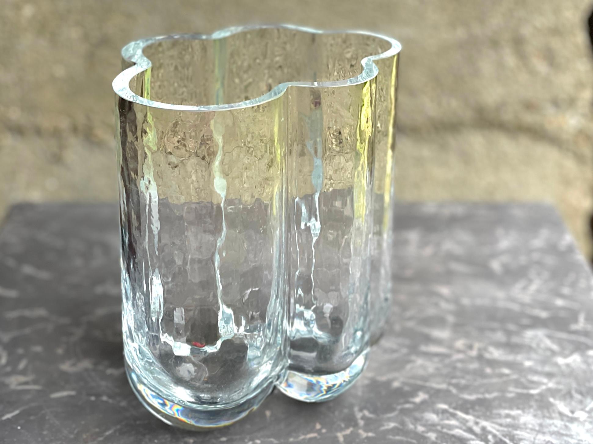 Vintage studio glass Cloud Vase, c. 1970s, made in Finland. The mouth-blown, organic-form studio glass vase is dazzling accent piece to hold fresh flowers, or as a stand alone.


This item is part of the CABINE x WILDCRAFT MODERN Caumsett