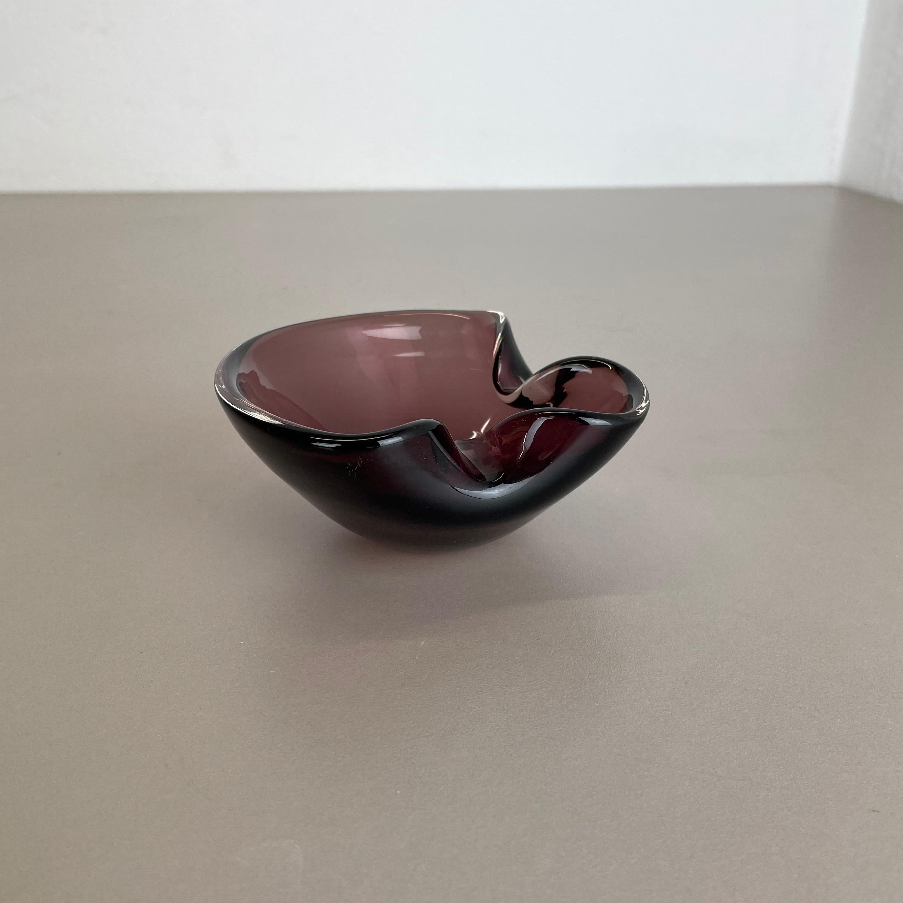 Article:

Murano glass bowl, ashtray element


Origin:

Murano, Italy


Decade:

1970s



This original vintage glass bowl element, ashtray was produced in the 1970s in Murano, Italy. It is made in Murano technique and has a nice