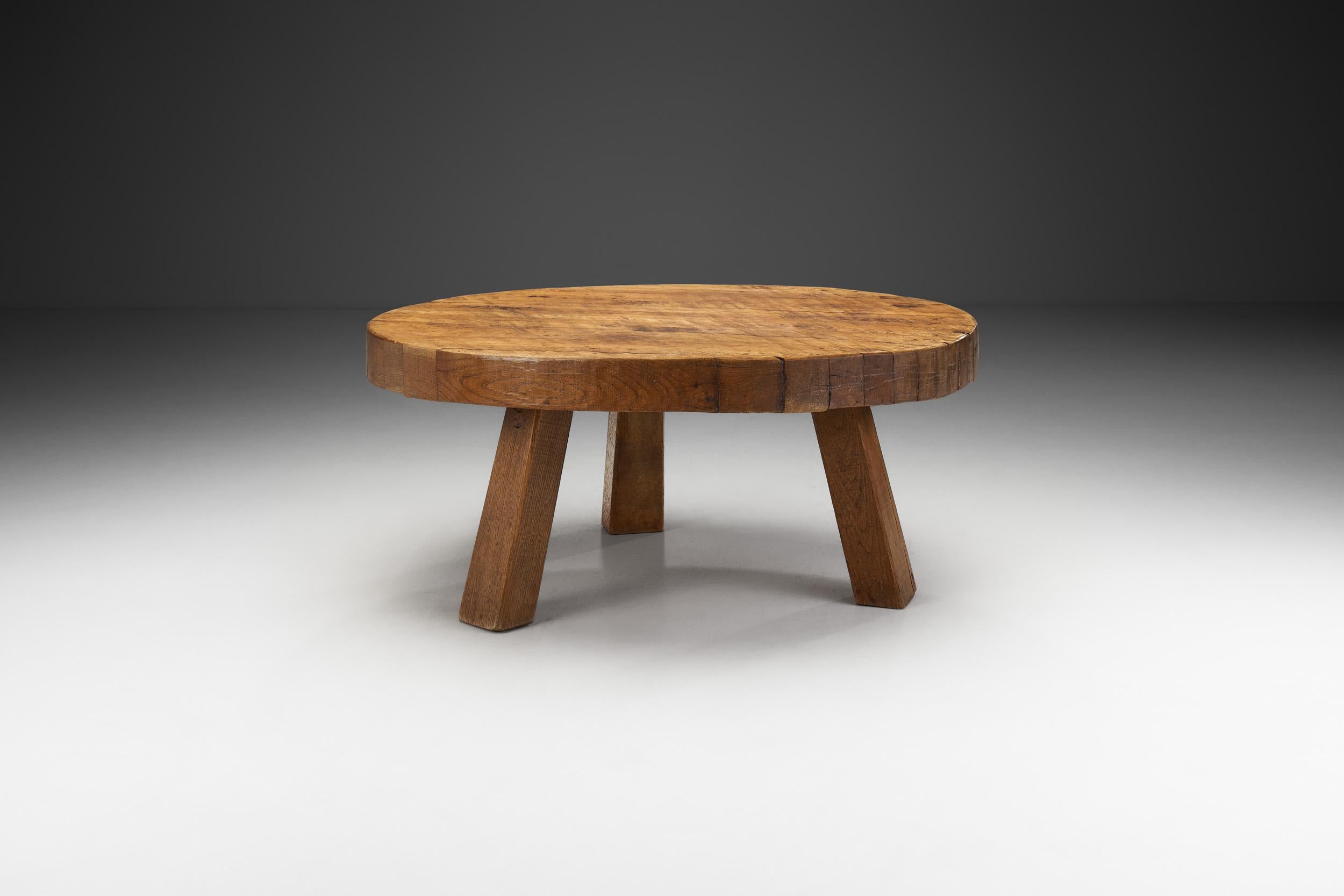 In most European mid-century design, there was an early emphasis on wood as it connected everyday objects, such as furniture to nature. This rustic, solid oak coffee table is a perfect example of this sentiment, and the visual benefits of an