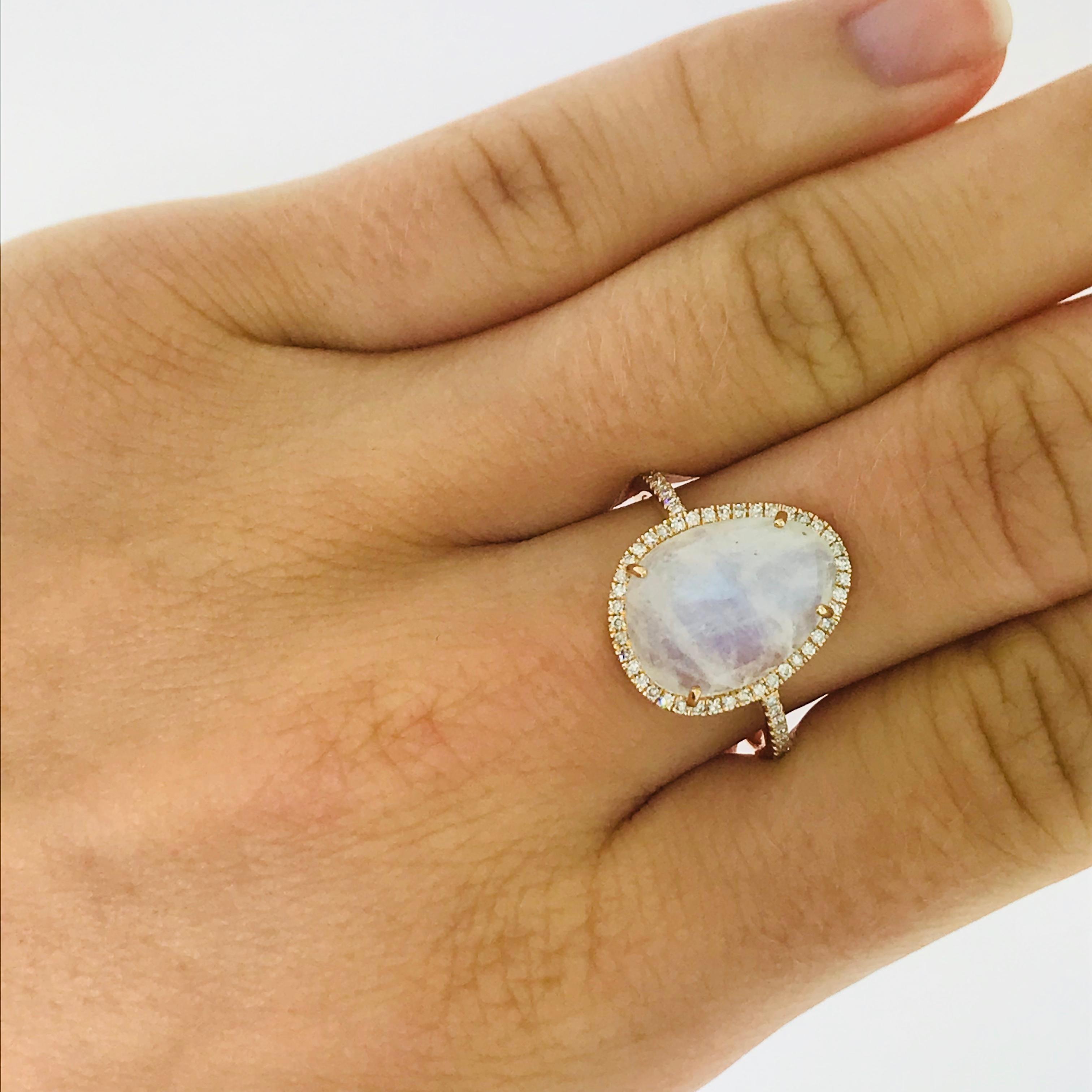 Genuine 4.75 carat  Rainbow Moonstone and Brilliant Diamond Ring with all the iridescence and sparkle!

This ring has a 4.73 carat Rainbow moonstone, cut and faceted in an organic shape, unique to this ring! The organic shape stays true to the