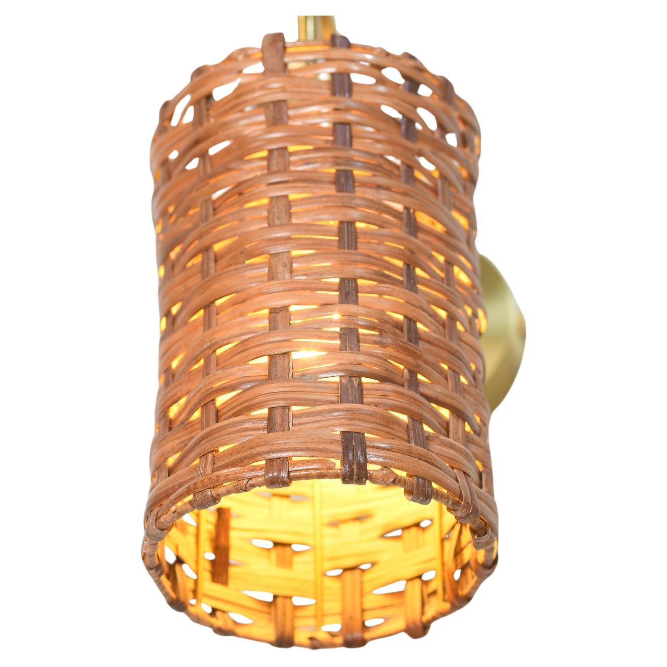 Where craftmanship meets calm simplicity, the Shpere- Shaped Rattan & Brass Wall Sconce

Each piece begins with handwoven rattan strands, shaped into a gentle sphere that radiates natural warmth. The intricate weave alows light to softly escape