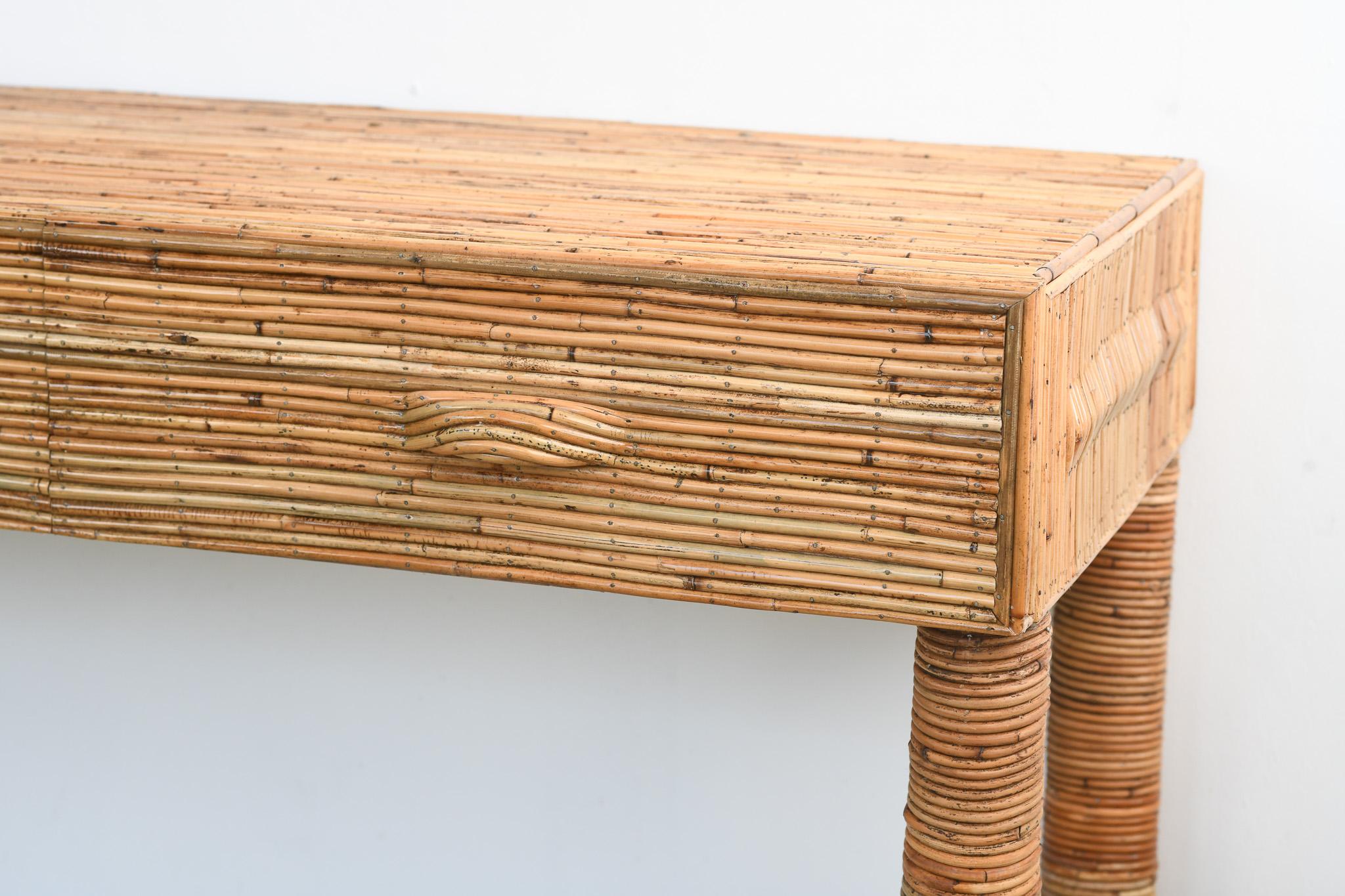 “Cardi” is Crafted entirely from sustainably sourced organic rattan and cane, this console table embodies earthy sophistication. Its rattan texture celebrates natural imperfections—each rattan piece tells a story of artisanal craftsmanship, creating