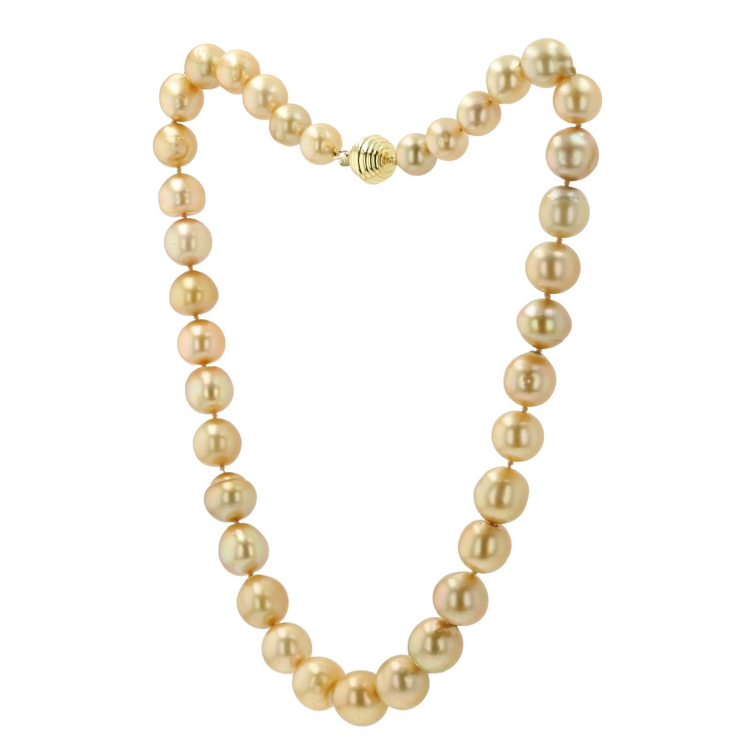 The rich, golden glow of this stunning strand of South Sea pearls is captivating. 36 uniquely individual specimens were hand selected by our gemologist for their high luster and lovely colors to assemble this necklace. Grandly sized and graduating