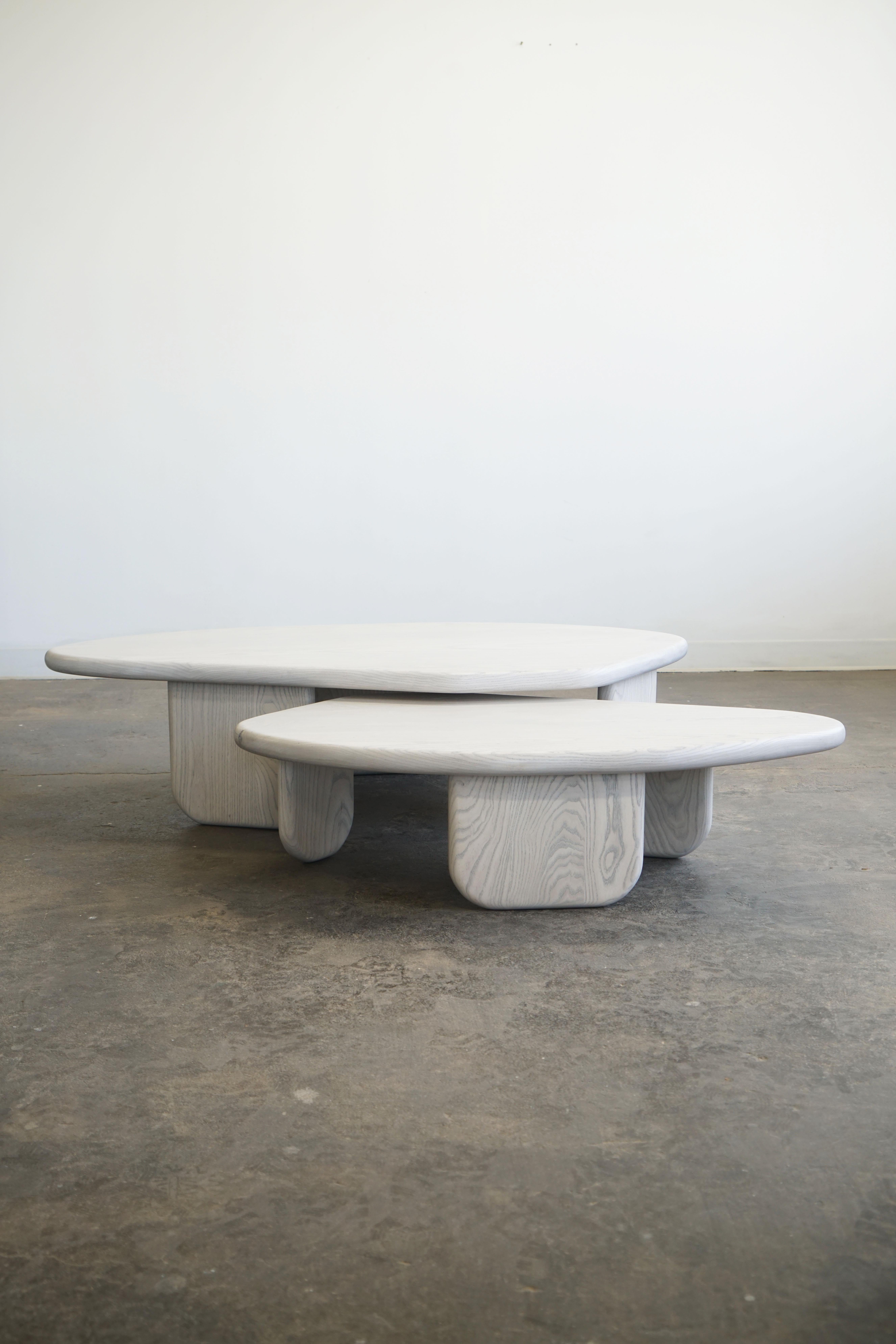 Organic shaped nesting coffee tables by Last Workshop
Silk Grey Ash finish

Table one: 58