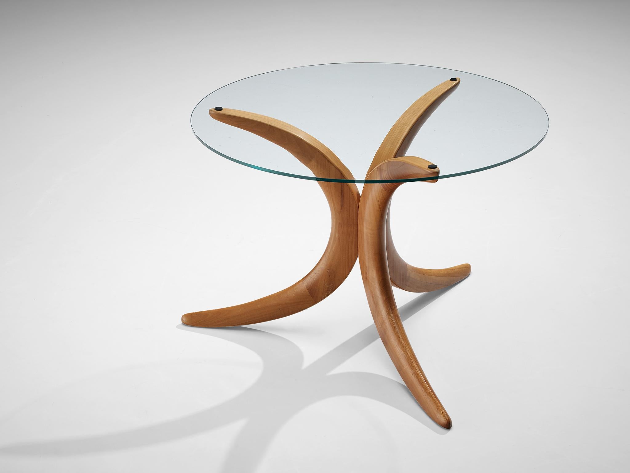 Organic coffee table, wood, glass, Italy, 1970s

Solid wooden tripod coffee table from Italian origin. With the transparent glass top, the base manifests itself as a sculptural object. The wooden connections are a nice detail.

