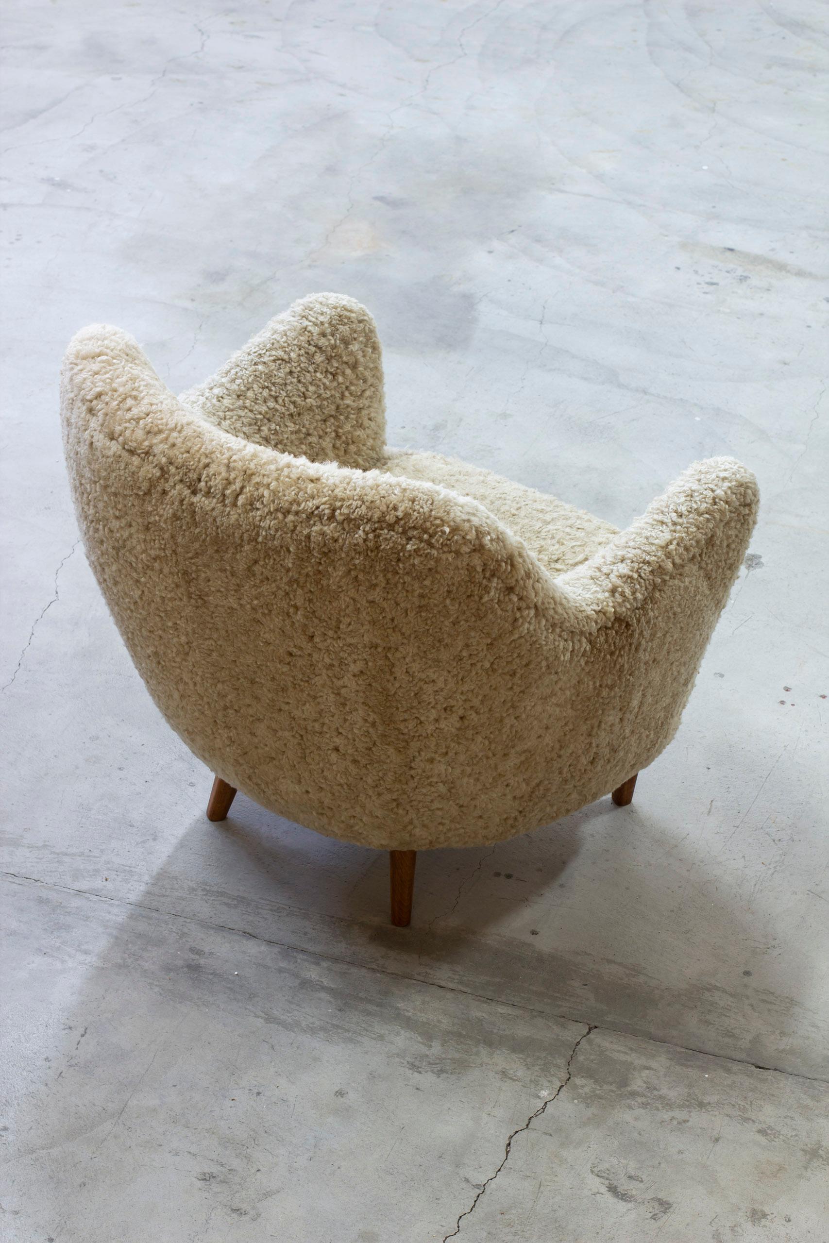Danish Organic sheepskin lounge chair in the style of Finn Juhl