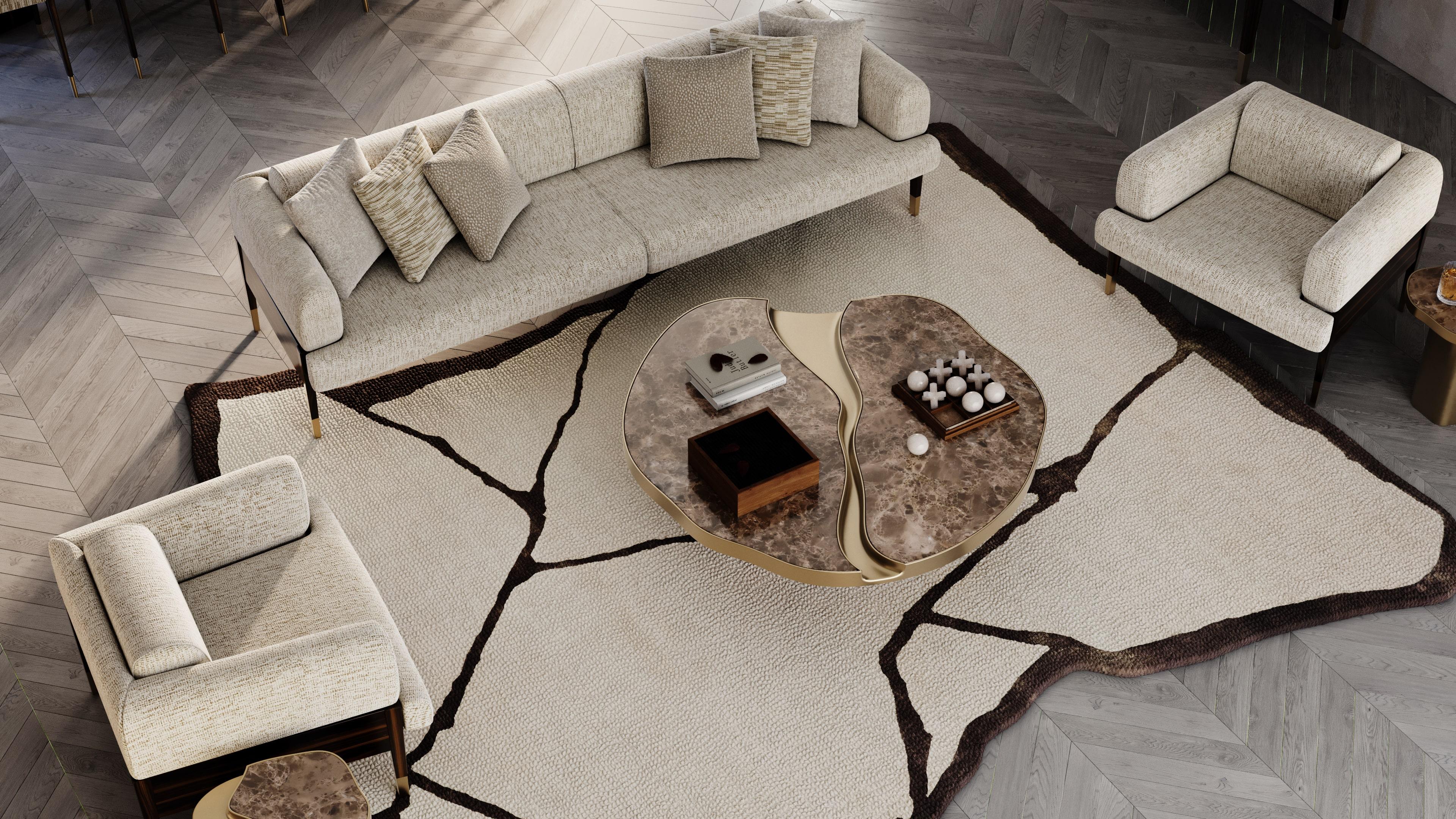 Prism rug defies convention with its fluid, organic silhouette, this hand-tufted rug speaks in soft curves and earth tones. Prism isn't bound by symmetry; it meanders, breathes, and transforms the spaces it enters. Perfect beneath a sculptural