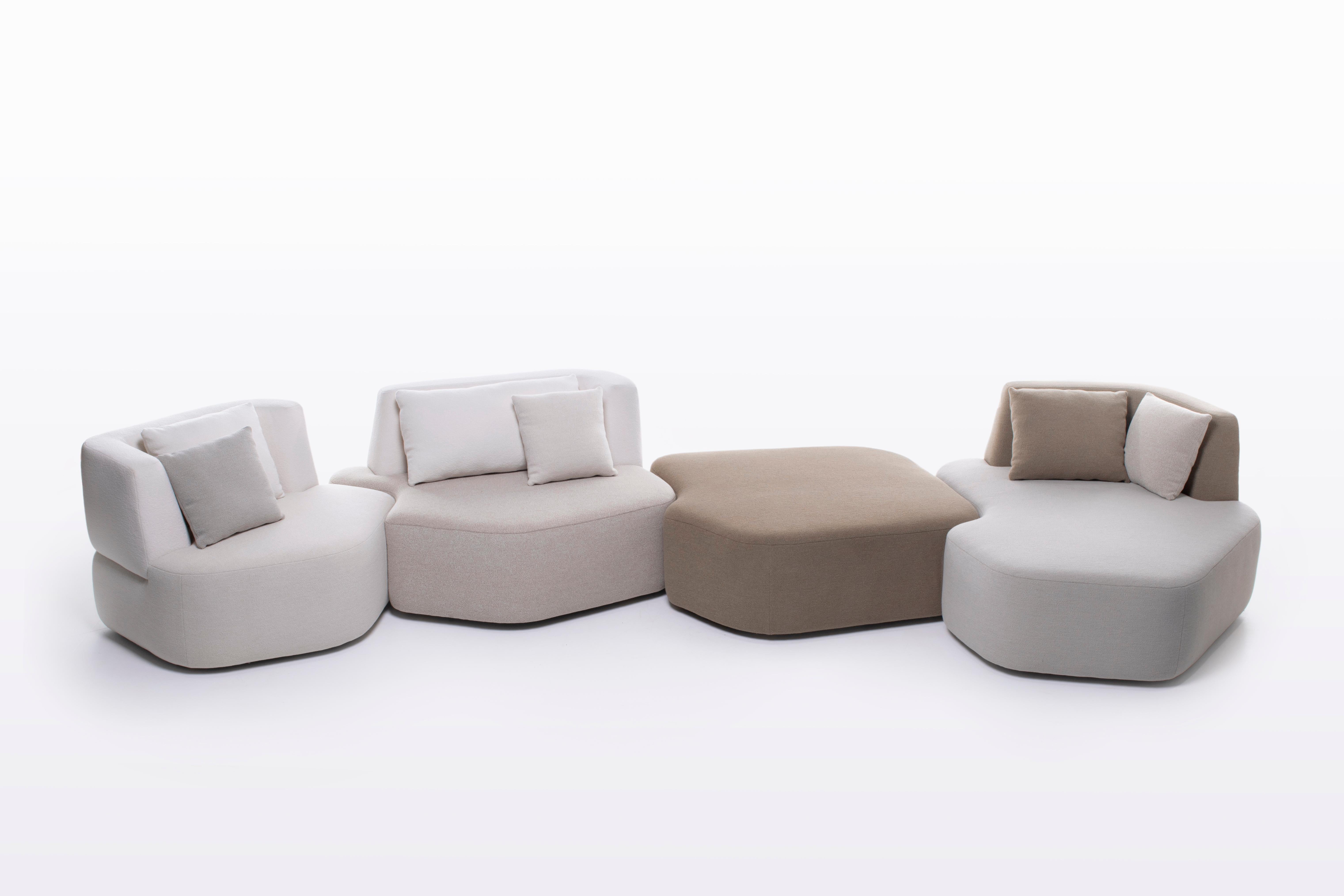 Pierre sofa was inspired by a photographic work Eric Gizard did in the summer of 2019 in Turkey. From white pebbles cleaned and rounded by the sea, he assembled some of them into abstract forms, joining together in organic articulation. Eric Gizard
