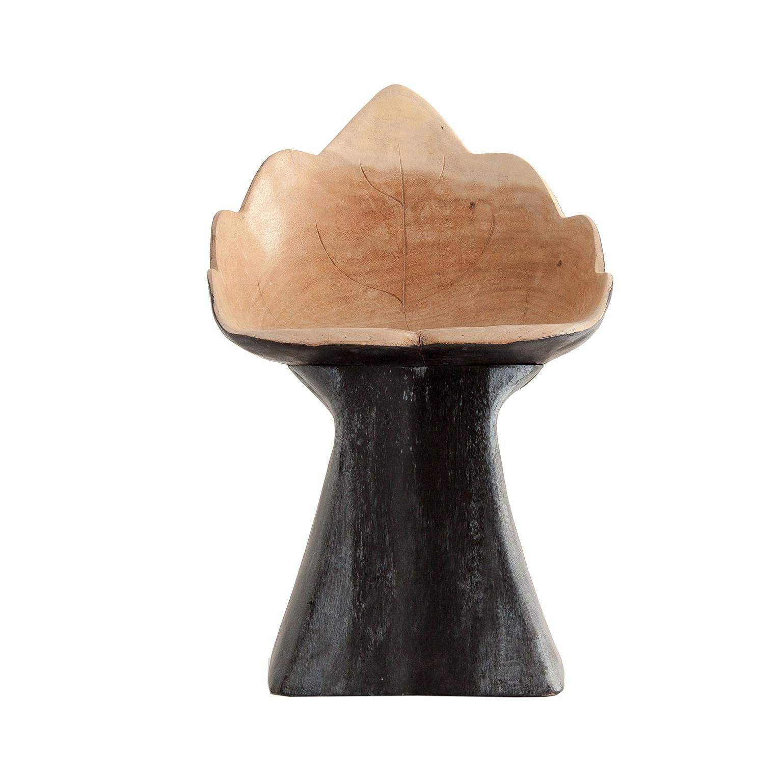 Organic design solid wood armchair leaf shaped.