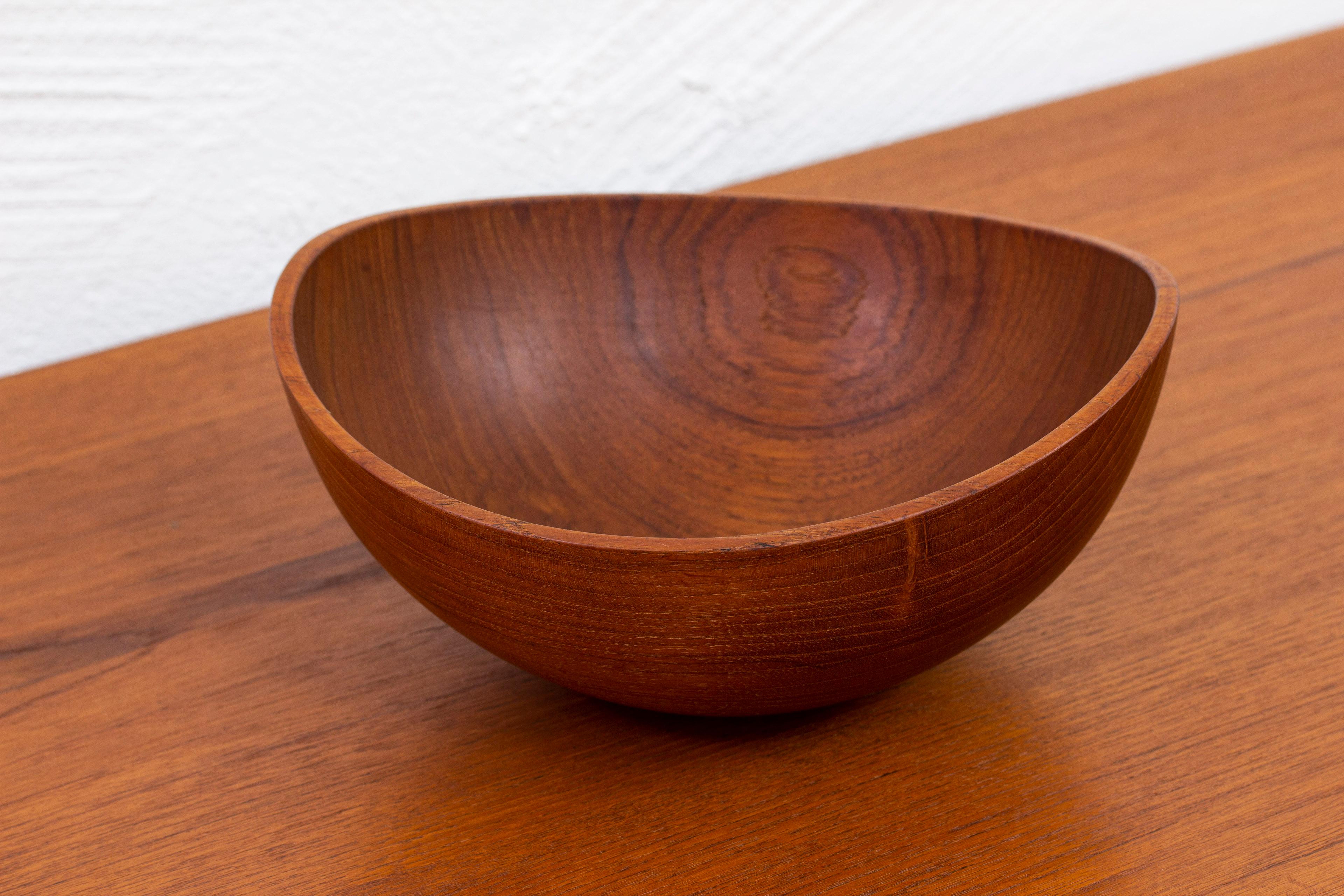 Bowl designed and made by Arvid Bergenblad during the 1950s. Hand made from solid teak. Signed with impressed burn mark. Very good vintage condition with light age related wear and patina.