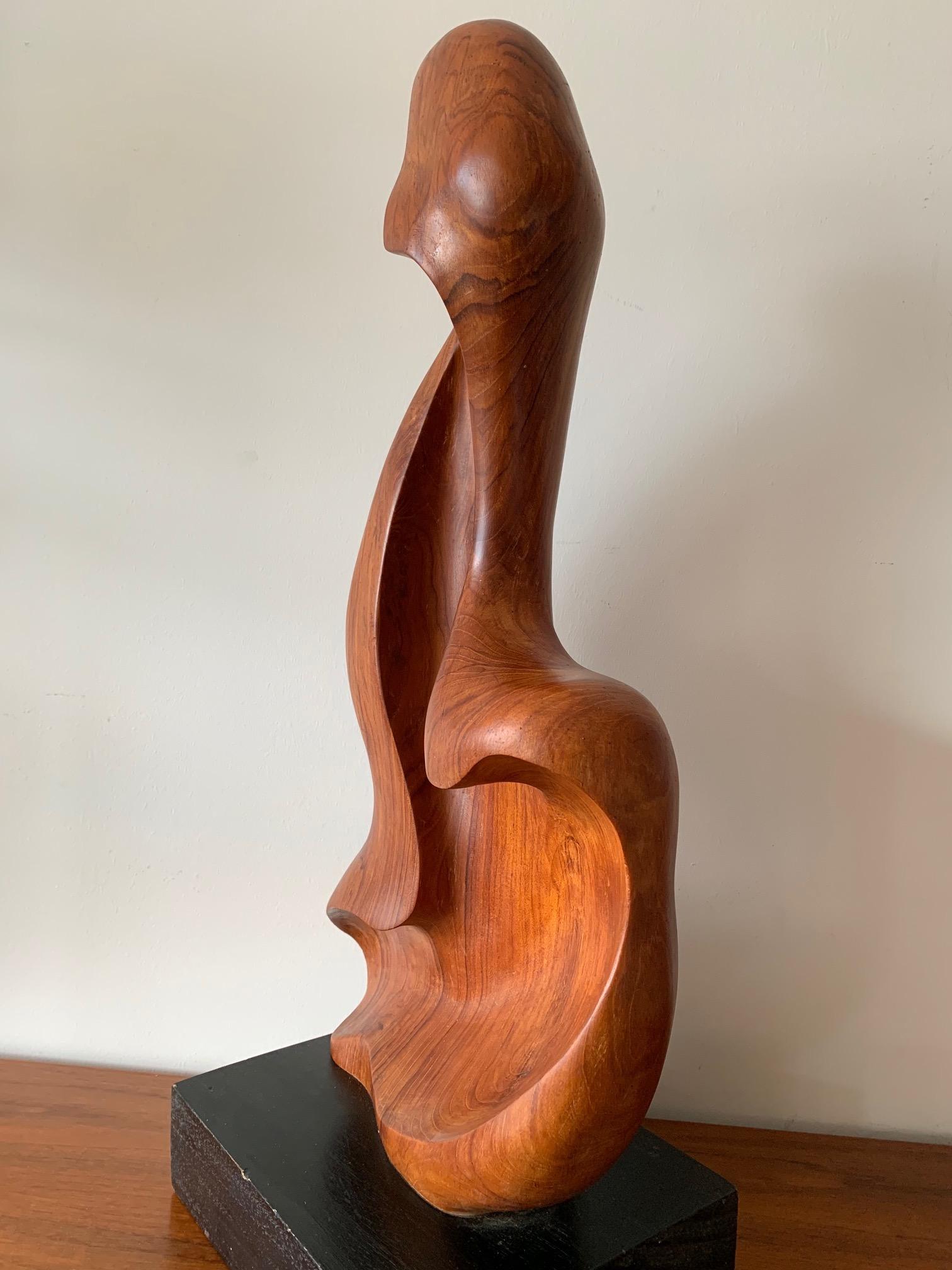 An unusual, sinuous teak wood sculpture, signed Appu. Indian artist, circa 1960s. While abstract the form is clearly derived from female figure.