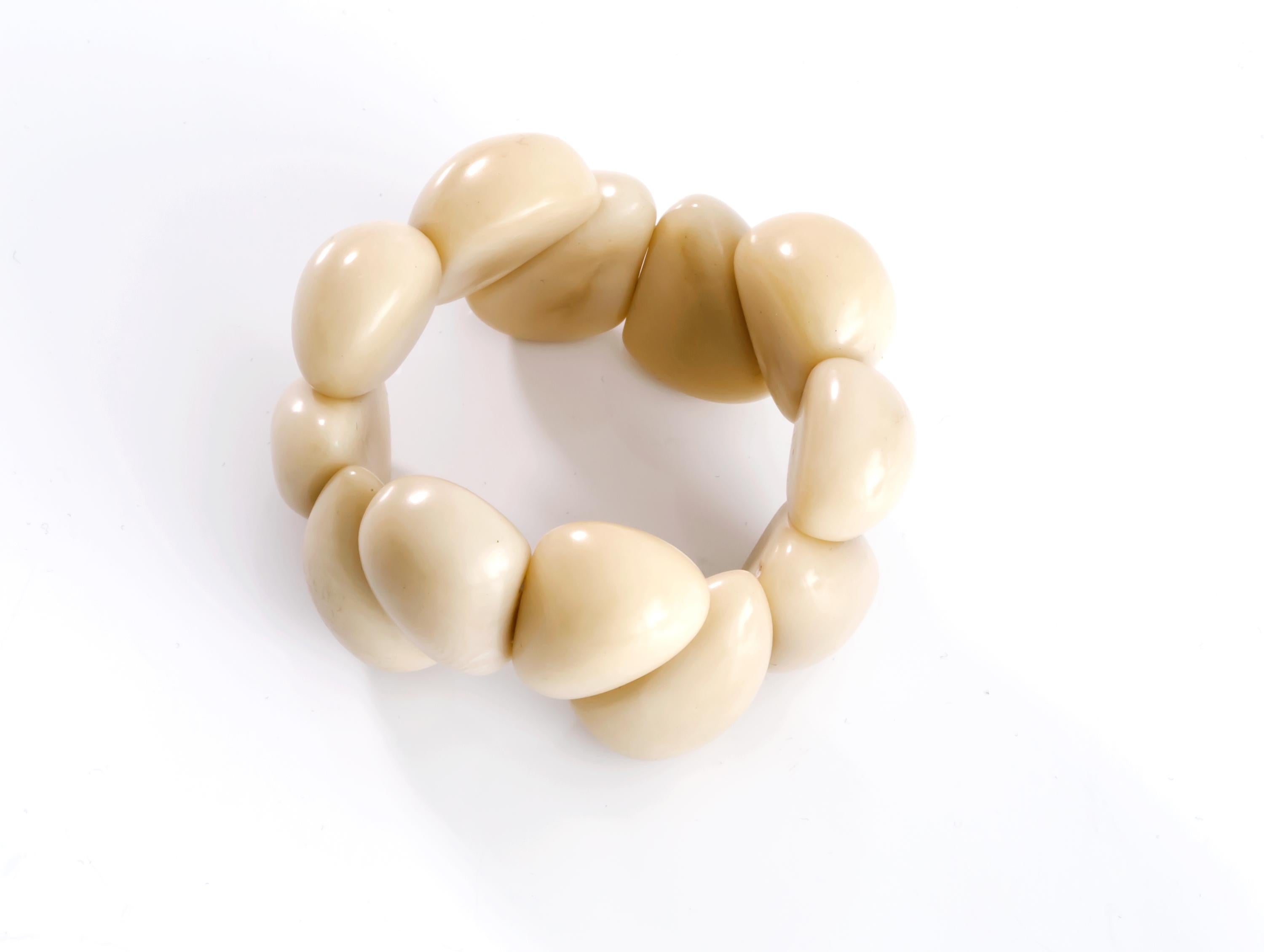 Wonderful, organic and decorative bracelet in tagua nut tree. Designed and made in Norway by Angelica Leon. The bracelet is in very good condition. 