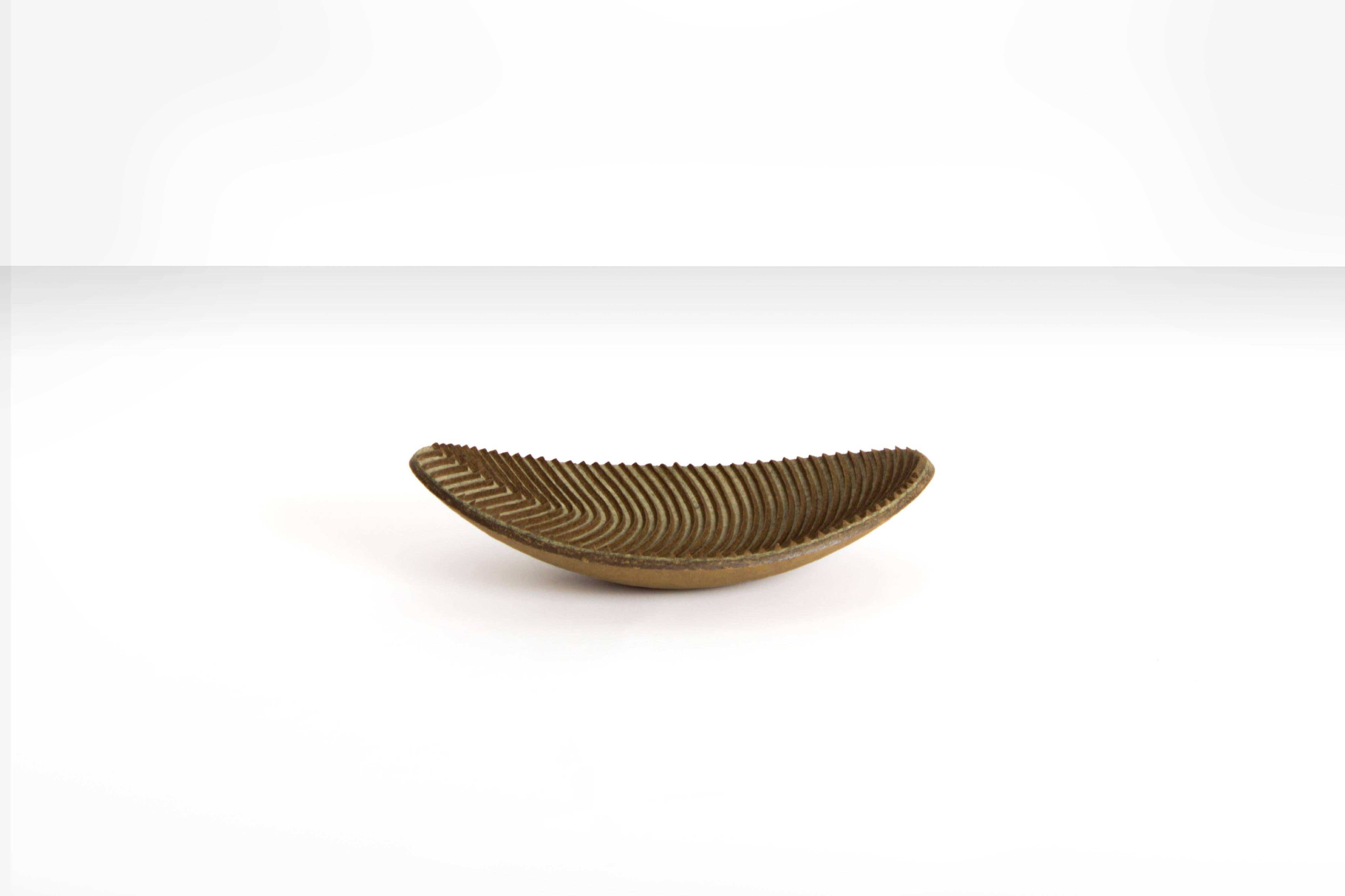 Organic Wabi-Sabi style bowl by contemporary artist Domingos Tótora, made of recycled cardboard.

About the artist:
Domingos Tótora (born and raised in Maria da Fé, Brazil, 1960) creates objects and sculptures where beauty is inseparable from