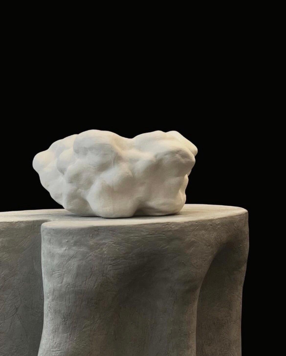 Hand-built sculptural cloud shaped vase/bowl in stoneware material by Hanna Englund Ceramics. Finished with porcelain slip on the outside and clear glaze inside.
Designed to stand alone as a sculptural focal point or use it as a bowl or a vase.