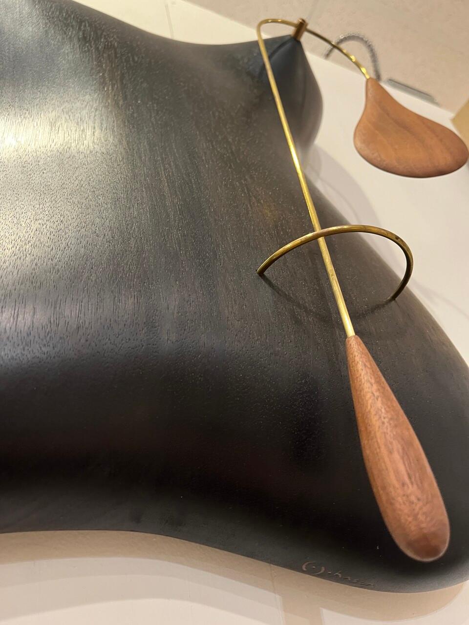 Organic Wood Carved Mobile Sculpture by Casey Johnson. A beautiful curvy mixed media piece reminiscent of Noguchi's freeform style. The wood is ebonized and polished smooth, you can't help but want to touch it!