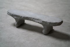Organically formed sidetable/bench • Object cast in Earth by CONCREET.