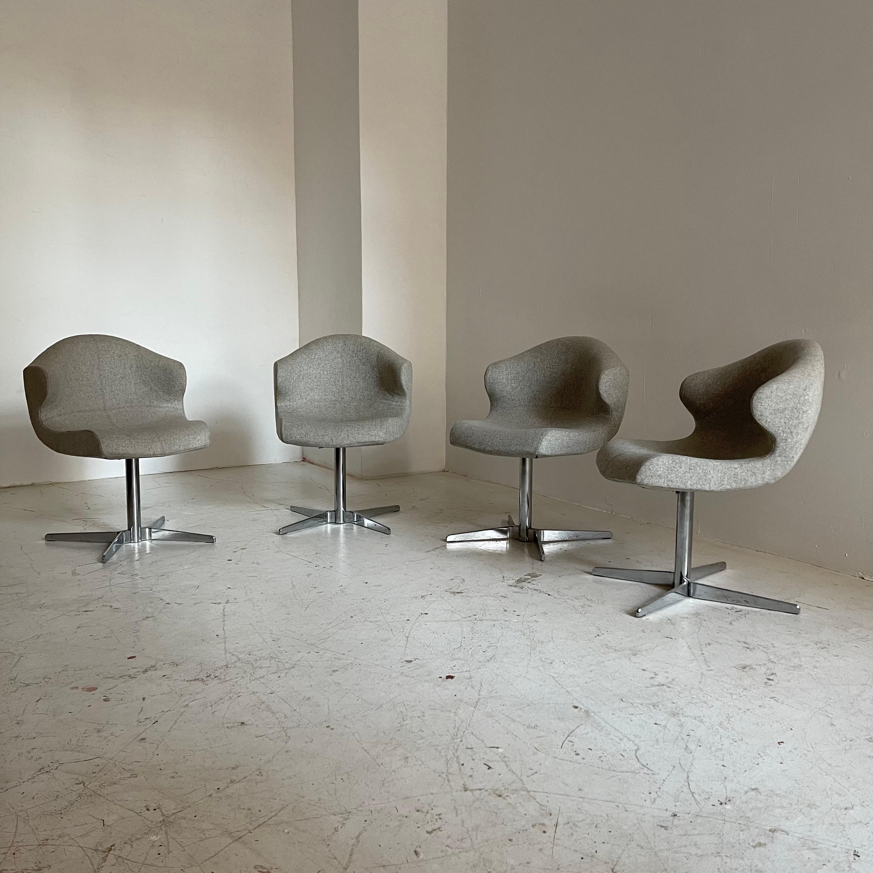 Sculptural Organically swivel dining chairs, set of four. France. Upholstered in light grey Kvadrat Divina MD wool fabric.