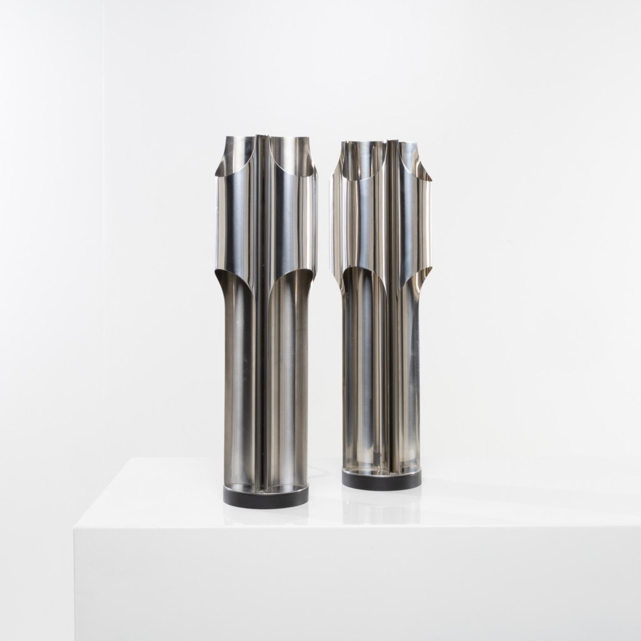 Pair of stainless steel lamps designed and manufactured by Maison Charles in Paris (Fr).
The steel base covered with a black imitation leather.
Each of the 4 organ pipes contains 2 bulbs (E27 socket), one illuminating the top, the other the