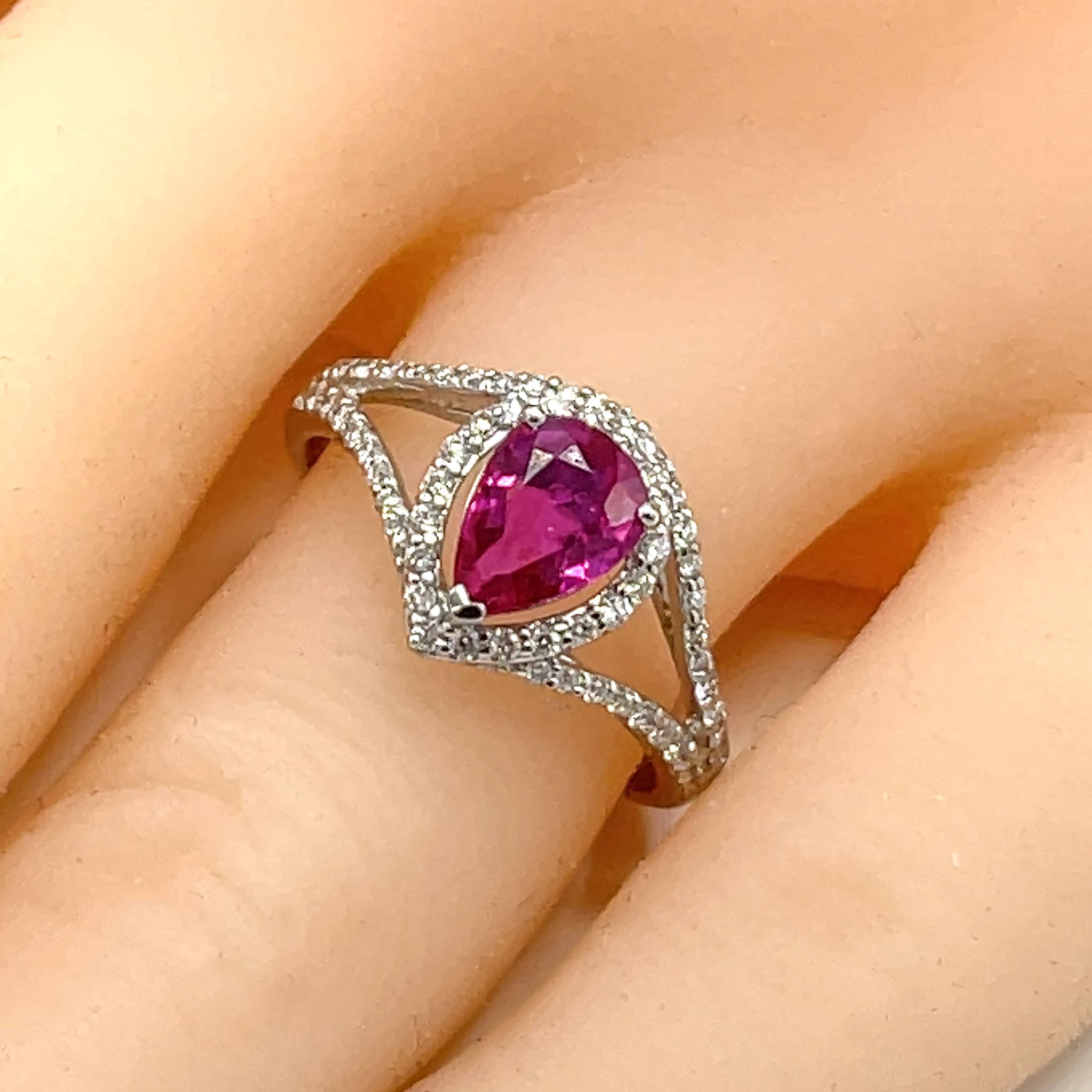 Platinum
GIA Report #: 5192710836
Shape: Pear
Natural Ruby - No Heat
Carat: 1.17 ct twd
Diamond: 0.33 ct twd
Ring Size: 7.25