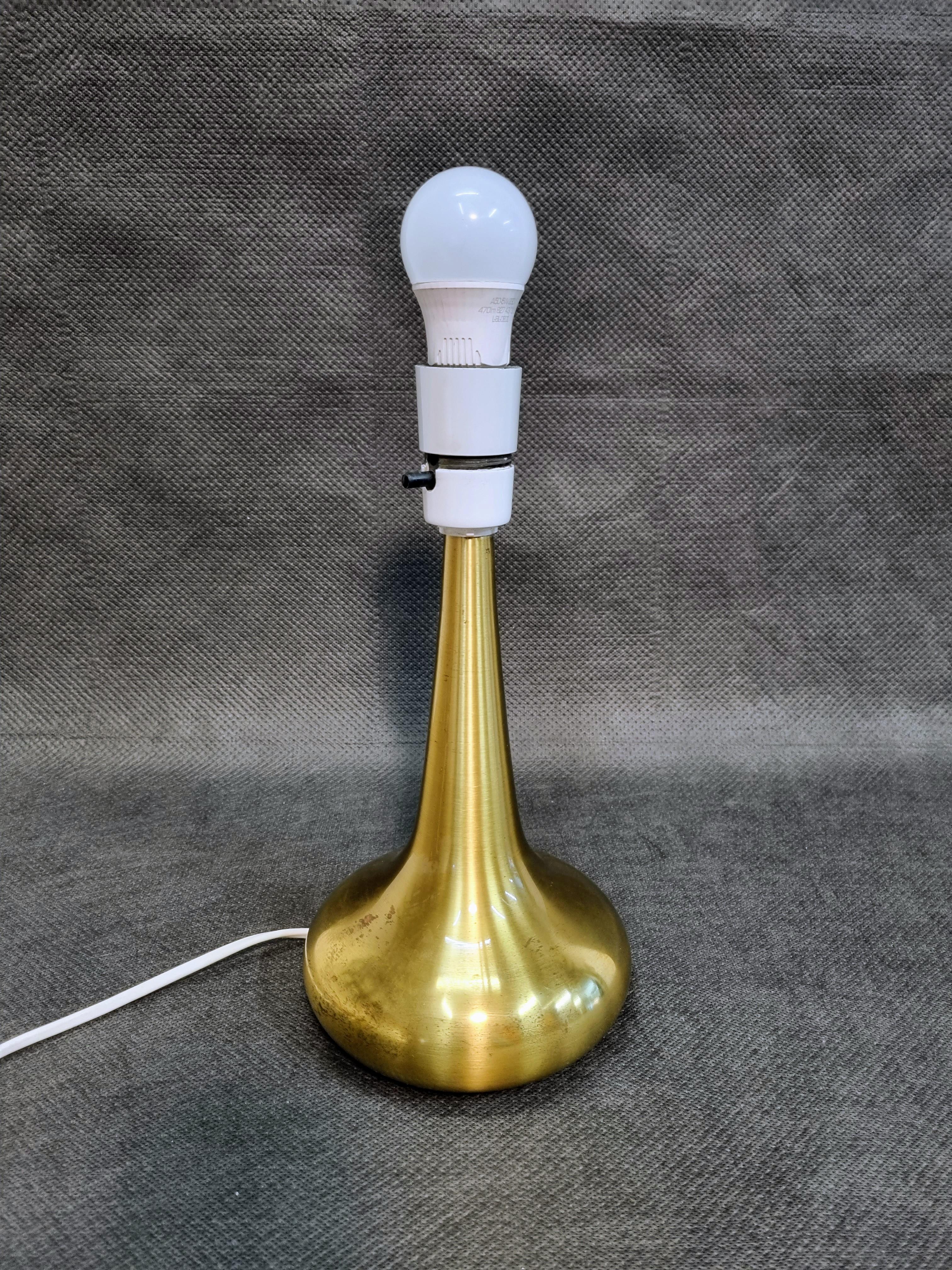 Brass table lamp, model Orient designed by Jo Hammerborg For Fog & Mørup in 1962. This is the small model, it is 28 cm high including socket, on and off button on the socket. This lamp is in good condition, although with a little patinated brass.