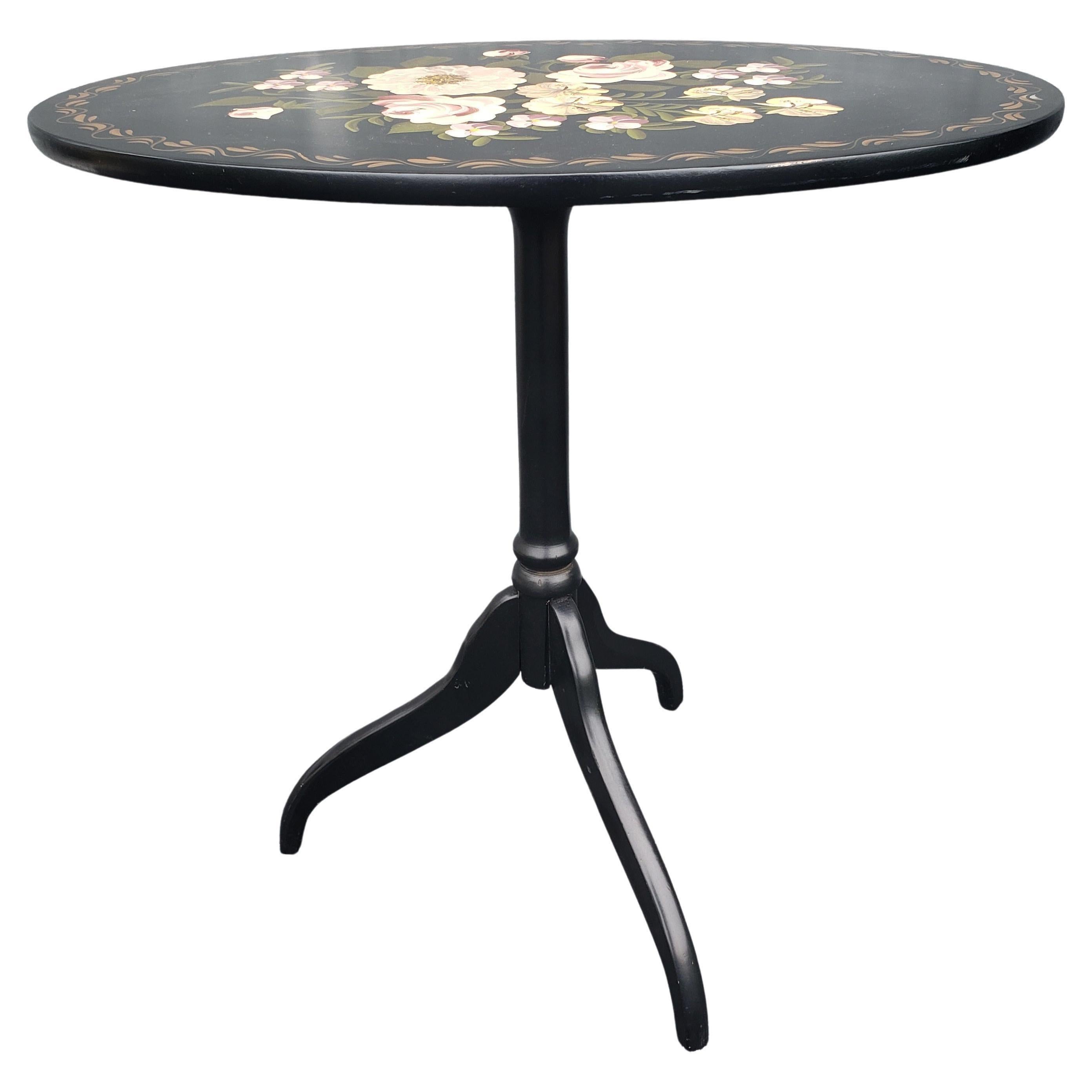 Absolutely gorgeous hand painted tilt top oval accent table. Amazing hand painted flowers with great details. Versatile use, cocktail table, tea table, Lamp Table etc.. 
Measures 26