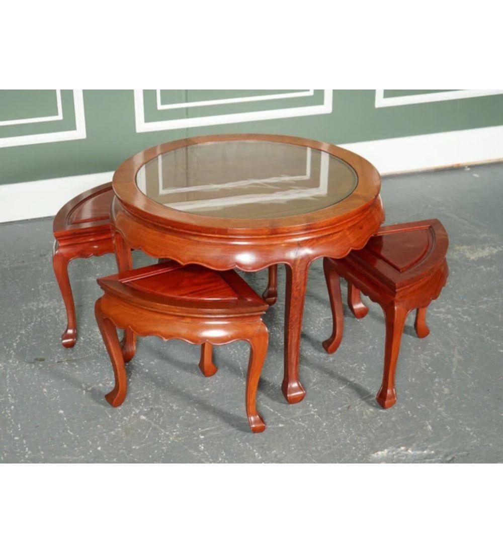 We are delighted to offer for sale this lovely Oriental Asian hardwood tea table with four seats.

We have lightly restored this by cleaning it, hand waxed and hand polishing the table and seats.

Dimension: 
Table: Ø 76 x H 54 cm,
Seats: W 35