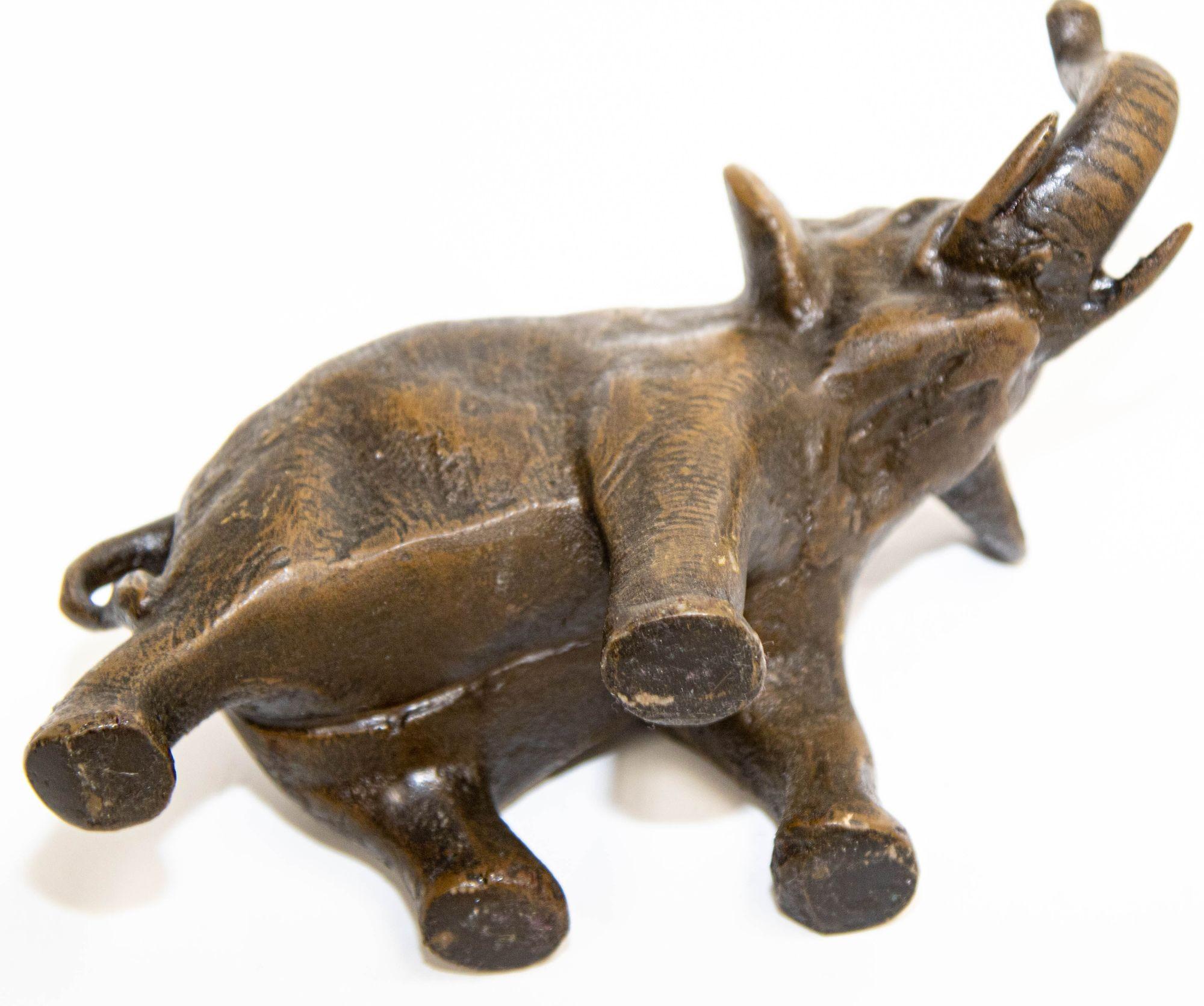 Oriental Cast Bronze Elephant Sculpture with Trunk Up For Sale 5