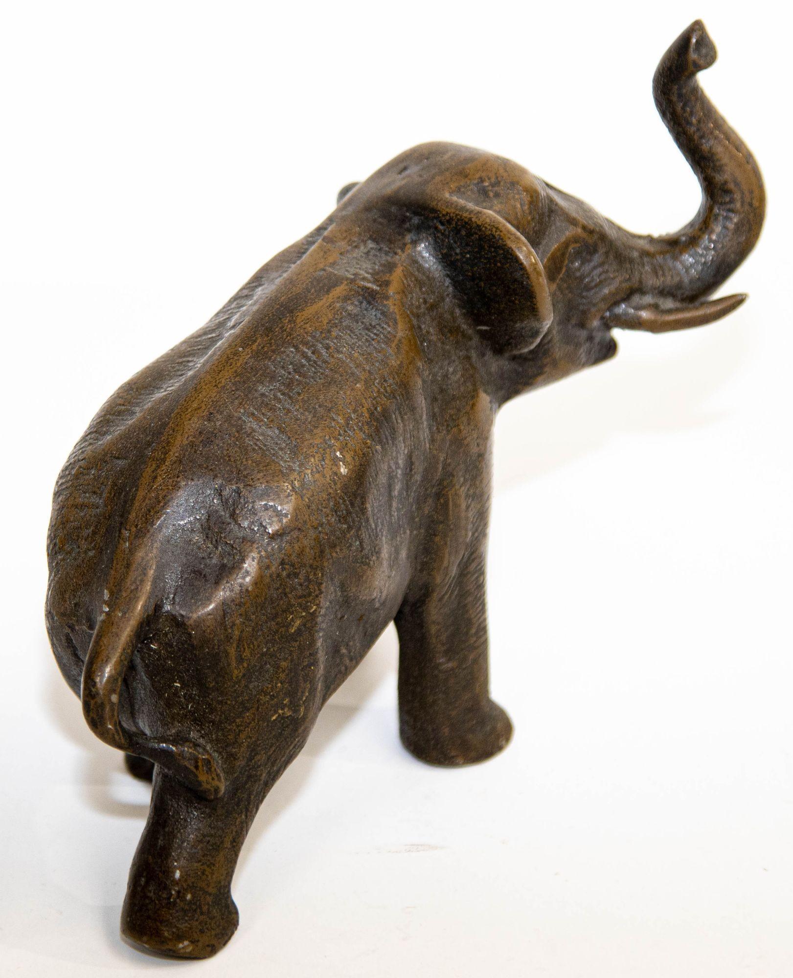 Japanese Oriental Cast Bronze Elephant Sculpture with Trunk Up For Sale