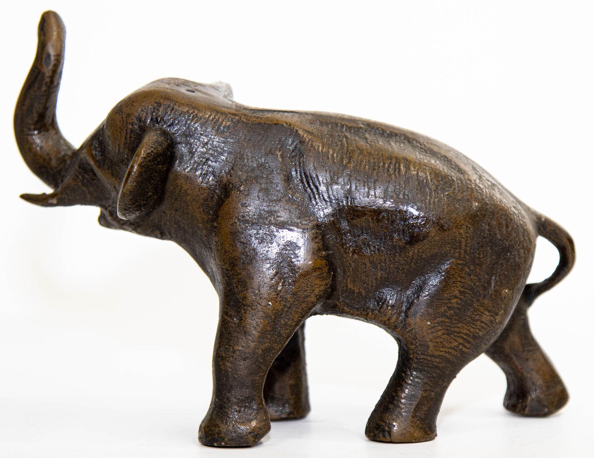 Oriental Cast Bronze Elephant Sculpture with Trunk Up In Good Condition For Sale In North Hollywood, CA