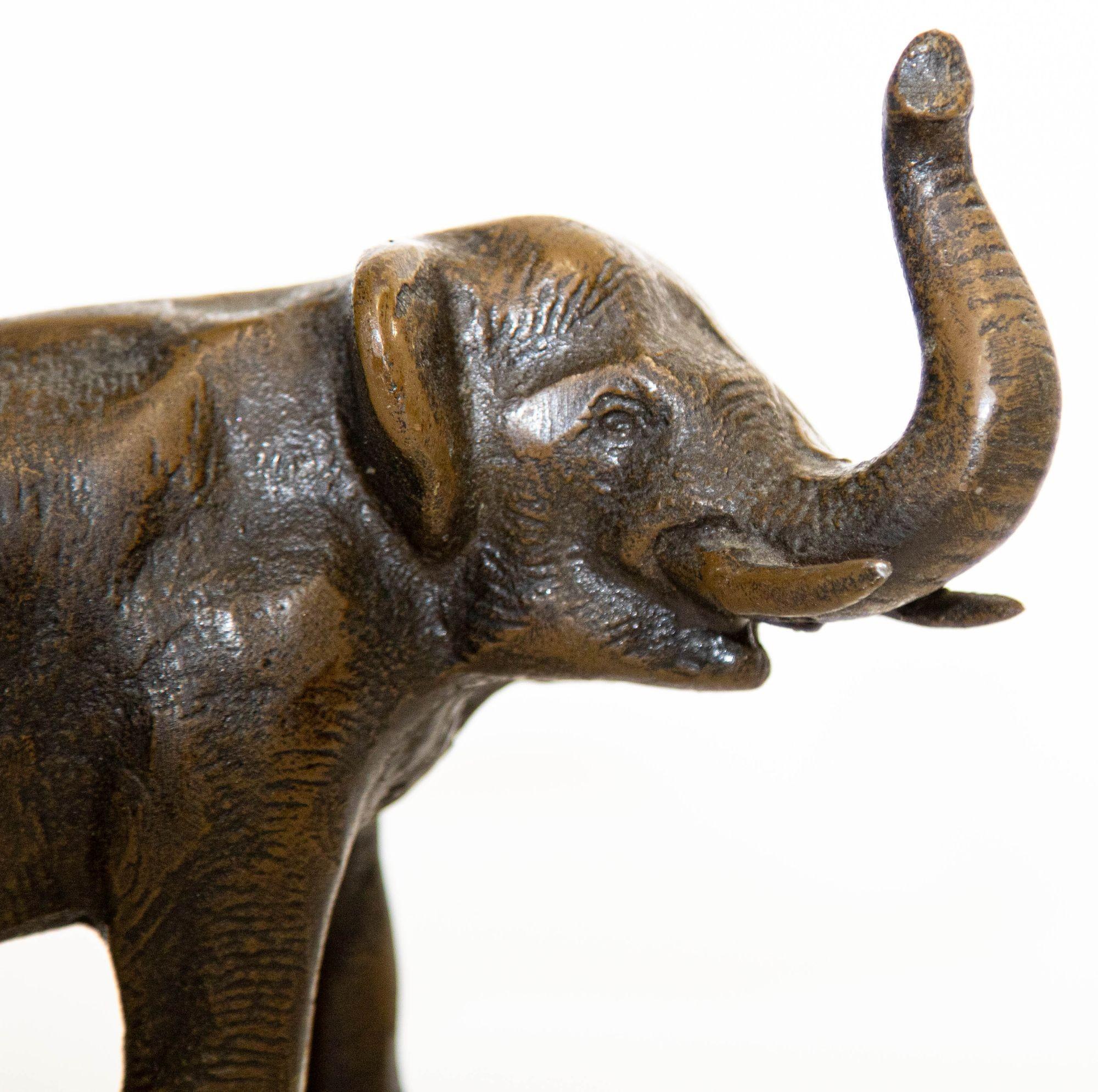 Oriental Cast Bronze Elephant Sculpture with Trunk Up For Sale 2