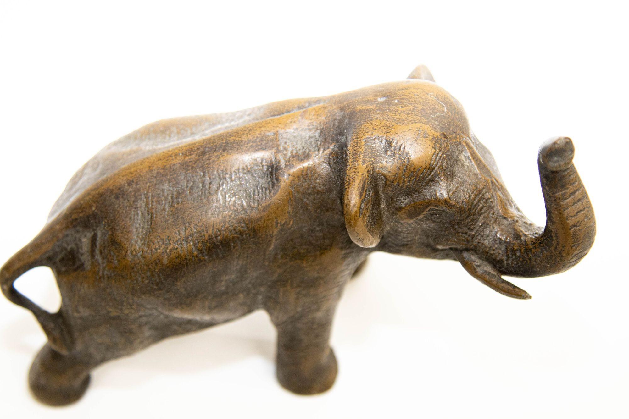 Oriental Cast Bronze Elephant Sculpture with Trunk Up For Sale 1