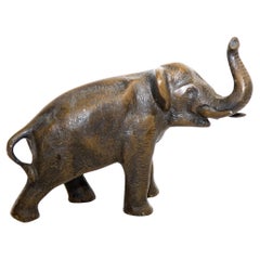 Oriental Cast Bronze Elephant Sculpture with Trunk Up