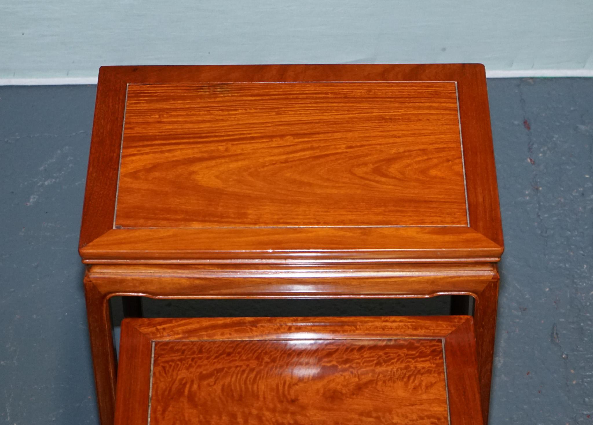 ORIENTAL CHINESE TEAK NEST OF FOUR TABLES WITH CARVED DETAiLS For Sale 1