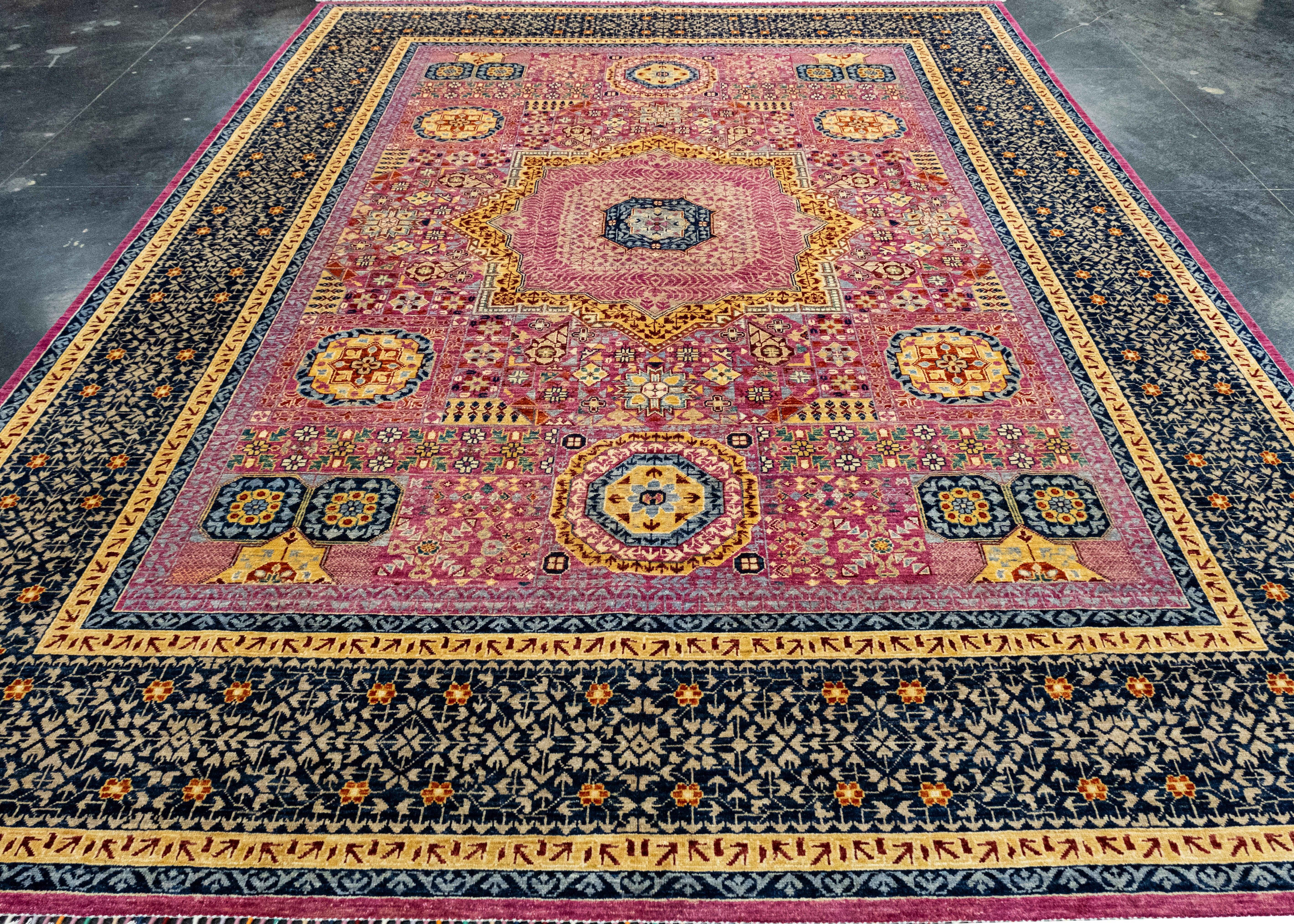 Tapis oriental noué à la main 9'3