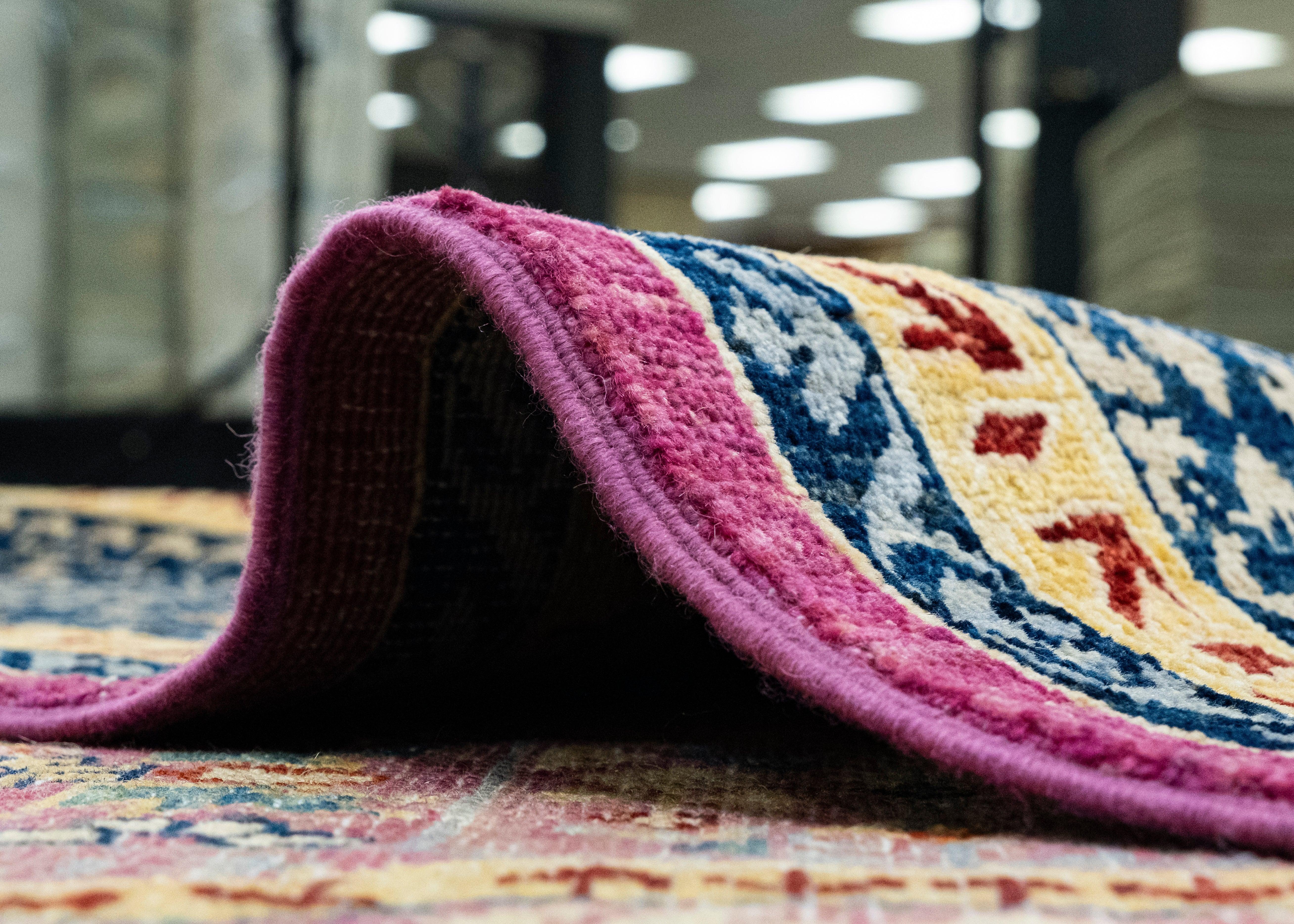 Tapis oriental noué à la main 9'3