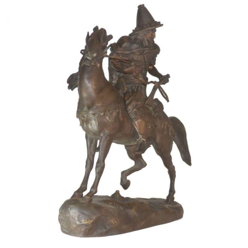 Oriental horseman by Charles Valton (1851-1918) late 19th century bronze with brown patina sign on terrace Spanish horse two dimensions length 31 cm for a height of 42 cm and a depth of 32 cm. note that a piece of the rifle is missing.

Additional