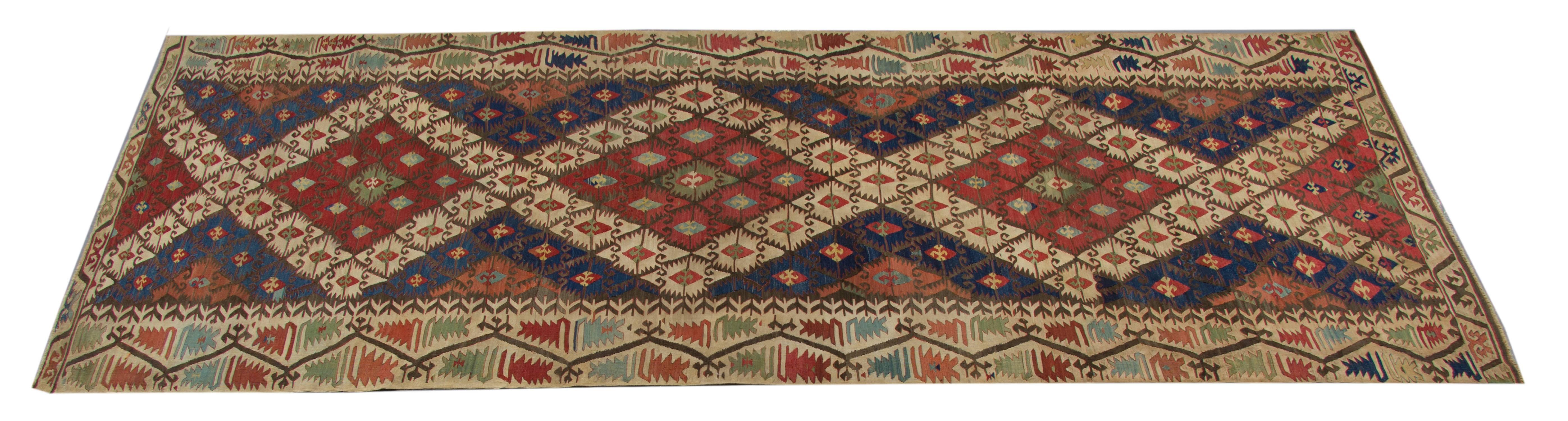 These are kilim rug handmade carpet Oriental rug antique runner rugs from Konya, which is located in the heart of Turkey. These large rugs are in excellent condition. The workshop Kilims of Konya are mostly known for their distinctive geometric rugs