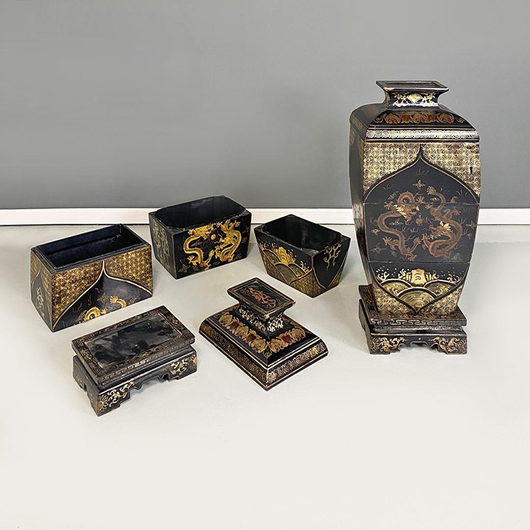 Oriental mid-century modern black wood vases or sculptures with decorations, 1950s
Pair of oriental modular sculptures in wood, in the shape of a vase or urn. Each of them is made up of five pieces, starting from the base, with three intermediate