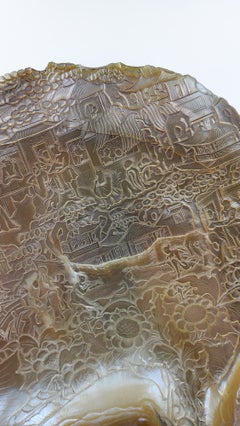 Oriental mother-of-pearl shell carved in low relief