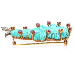 Oriental Motif Yellow Gold Brooch with Carved Turquoise Rubies and Diamonds