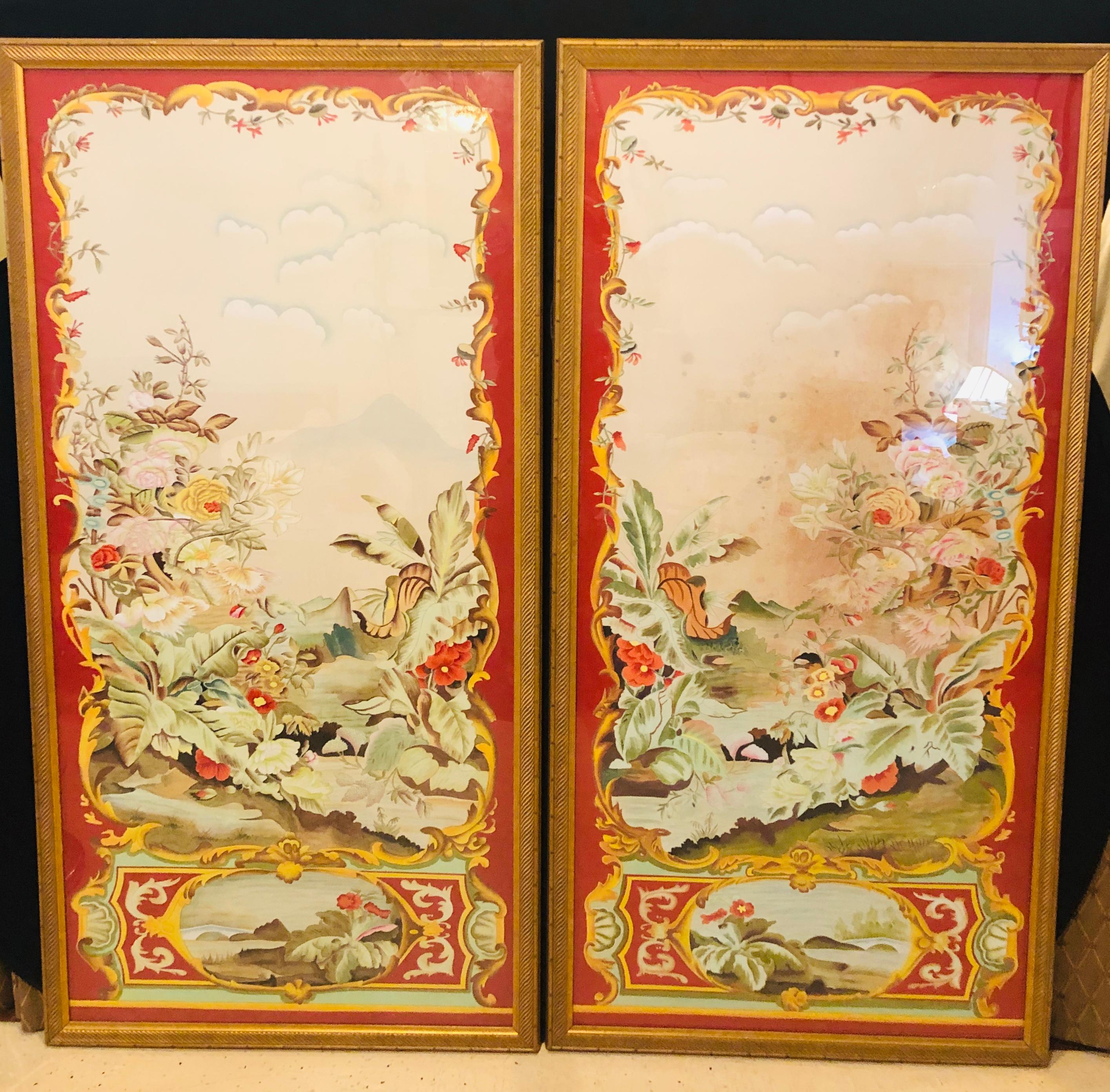 Oriental painted silk panels on fine gilt frames under plexiglass. A pair of very decorative panels under plexi in the finest of gilt frames. These large and impressive works are certain to add glamour to any setting. One with a slight stain